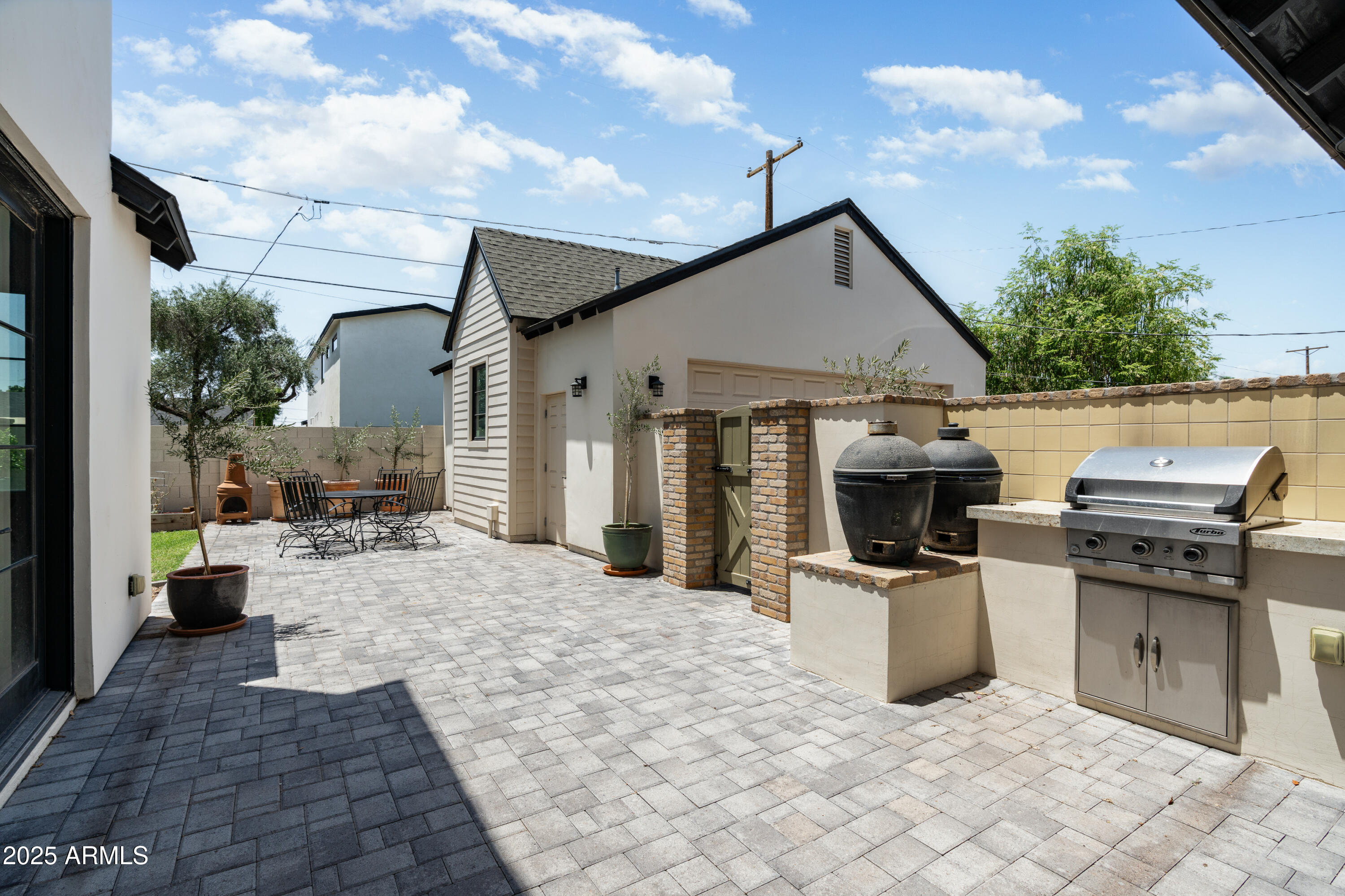 4901 East Amelia Avenue Phoenix, AZ 85018 - Photo 31 of 38 a view of kitchen with sink stove and refrigerator