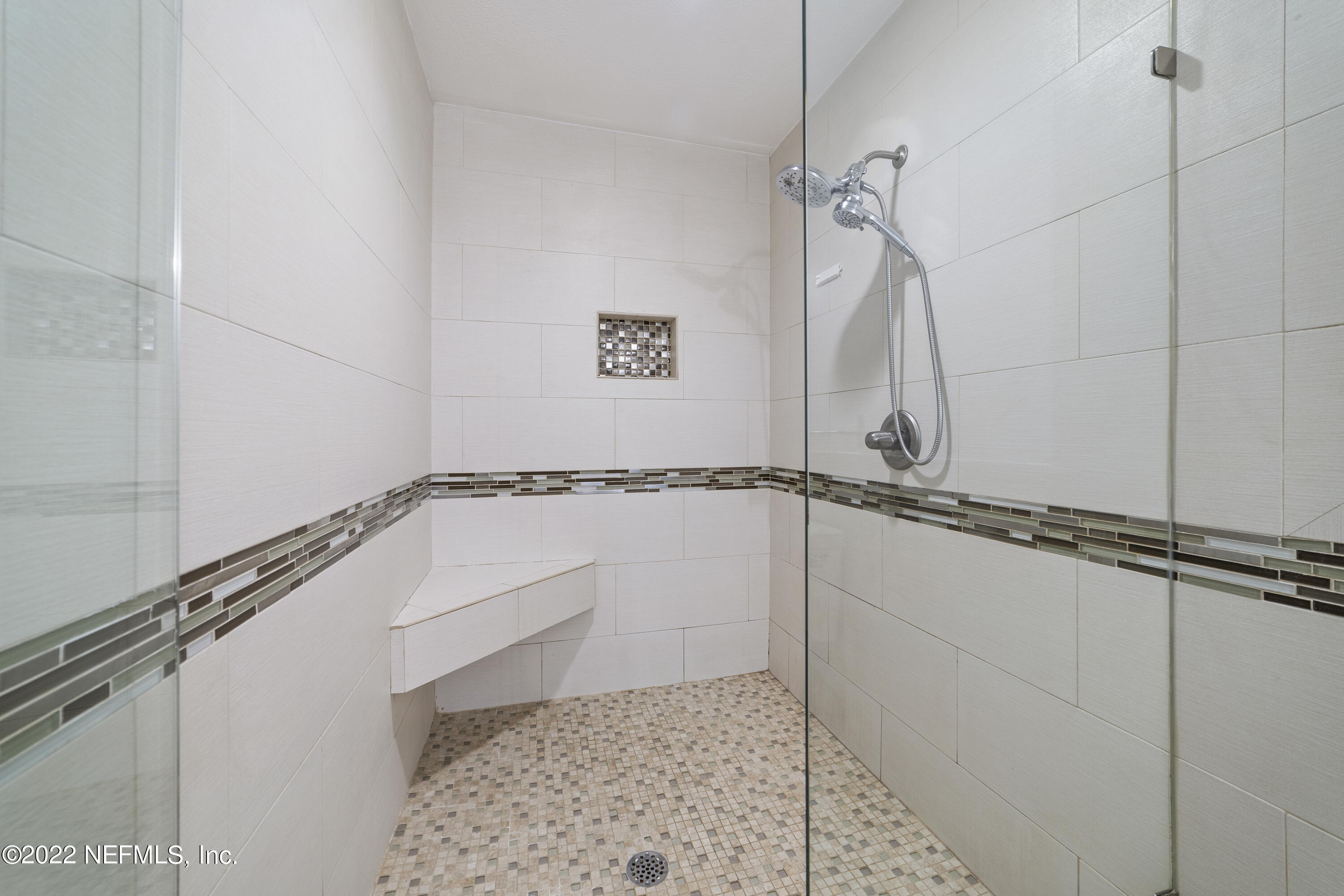 914 Prince Road St. Augustine, FL 32086 - Photo 12 of 26 a bathroom with a window and a shower