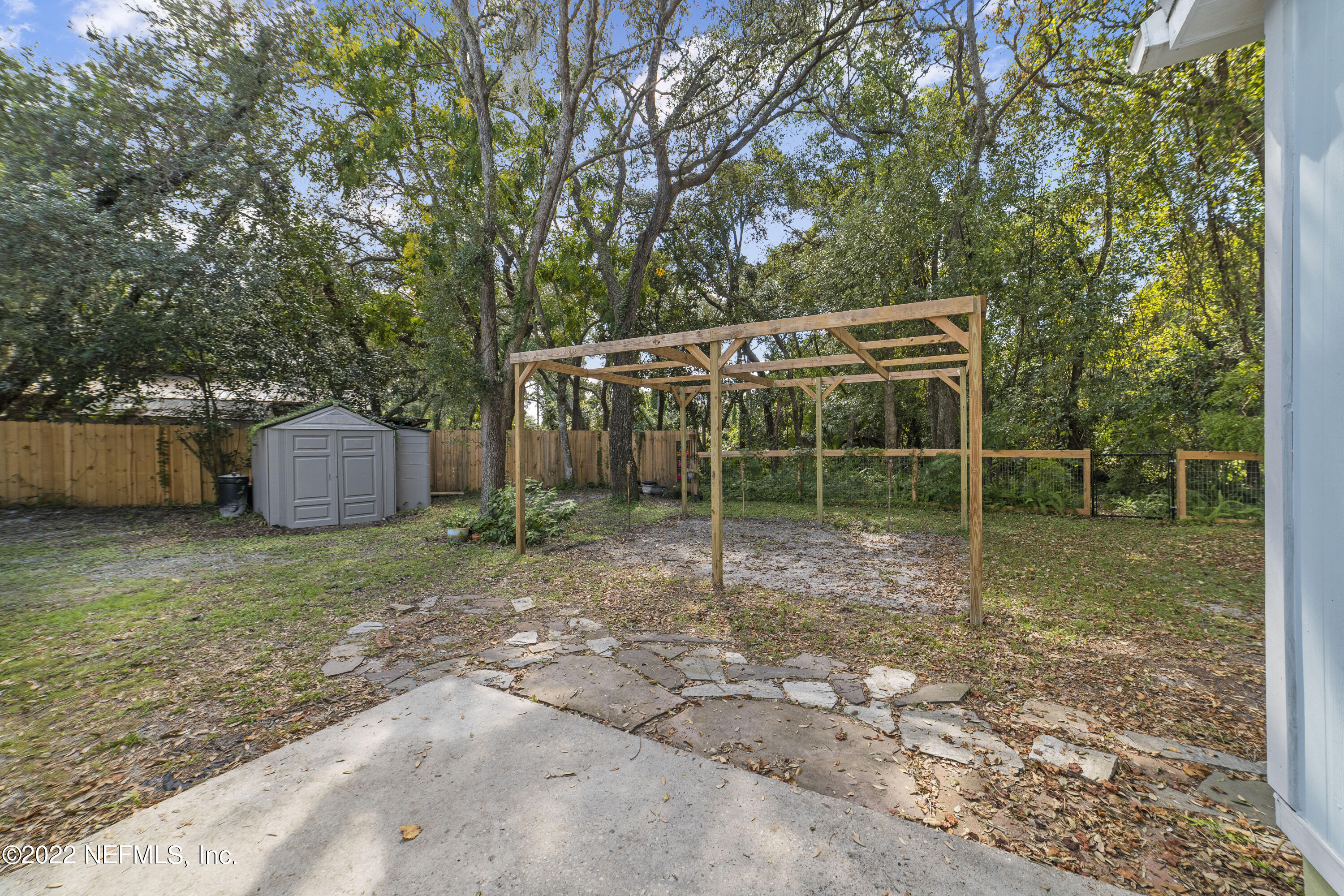 914 Prince Road St. Augustine, FL 32086 - Photo 3 of 26 a backyard of a house with green space