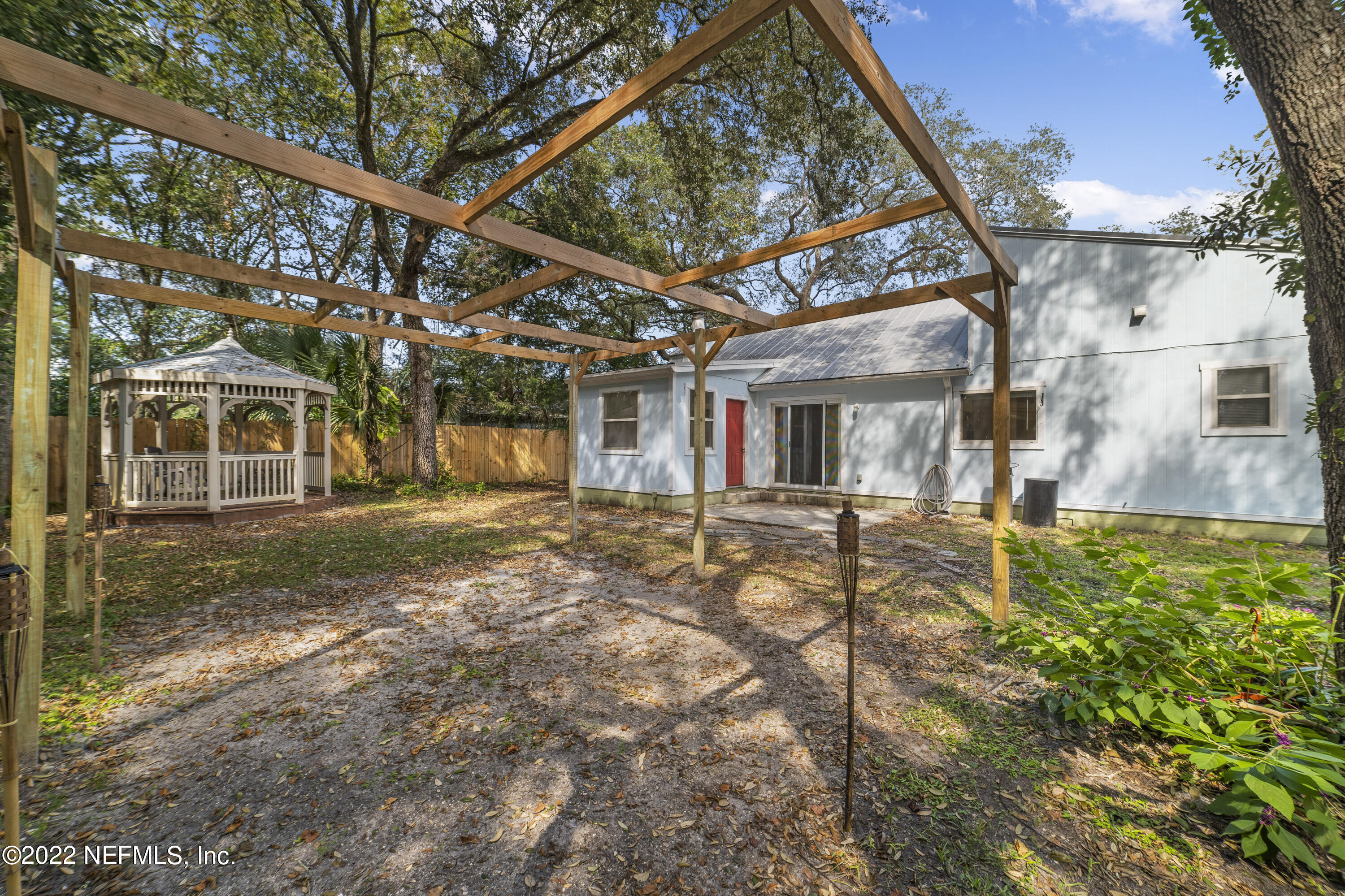 914 Prince Road St. Augustine, FL 32086 - Photo 5 of 26 a view of a house with a yard
