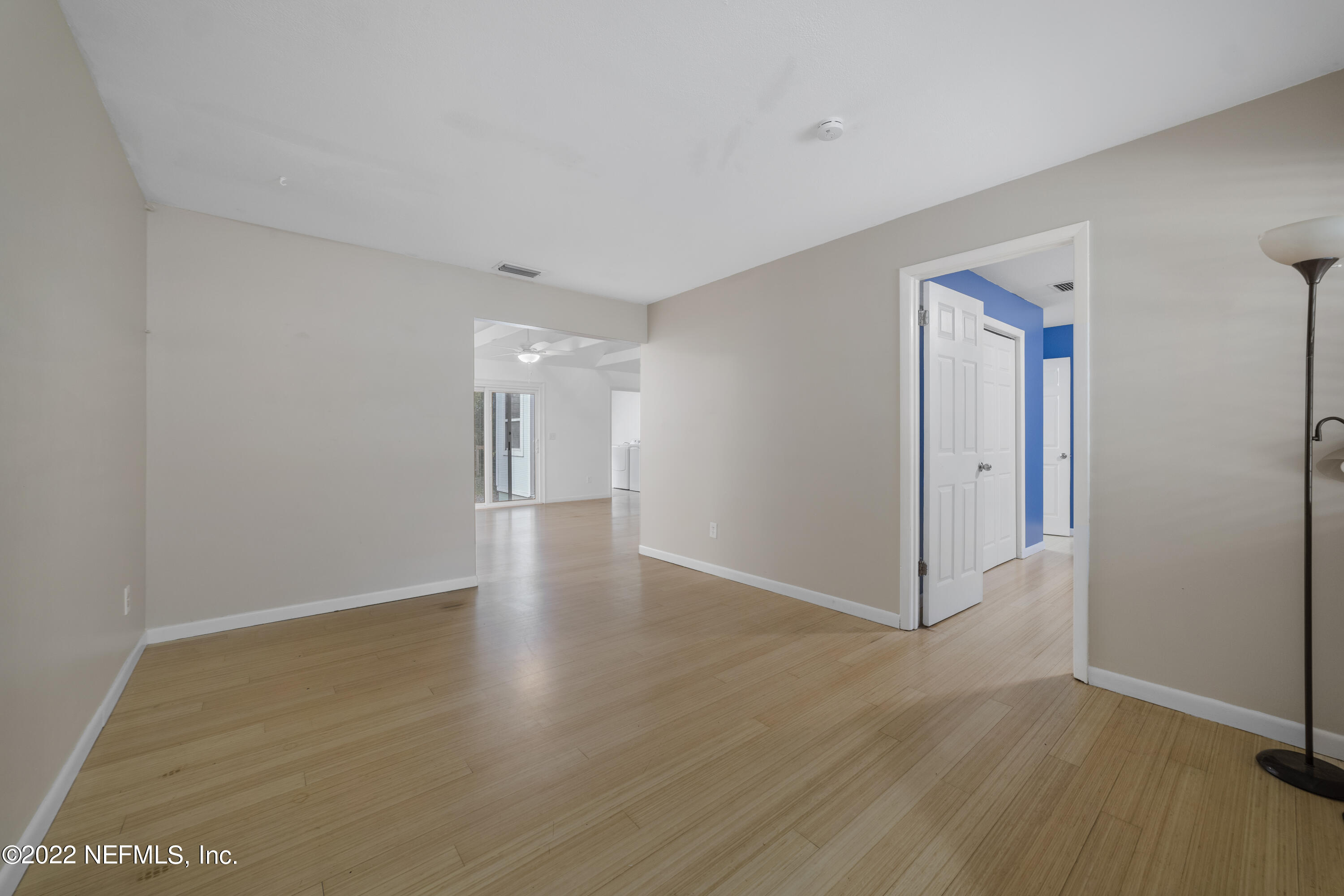 914 Prince Road St. Augustine, FL 32086 - Photo 6 of 26 a view of a hallway with wooden floor