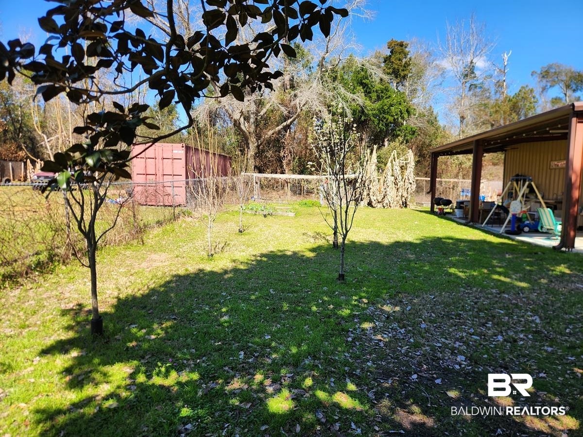 15461 Highway 98 Foley, AL 36535 - Photo 22 of 28 View of yard with a fenced backyard