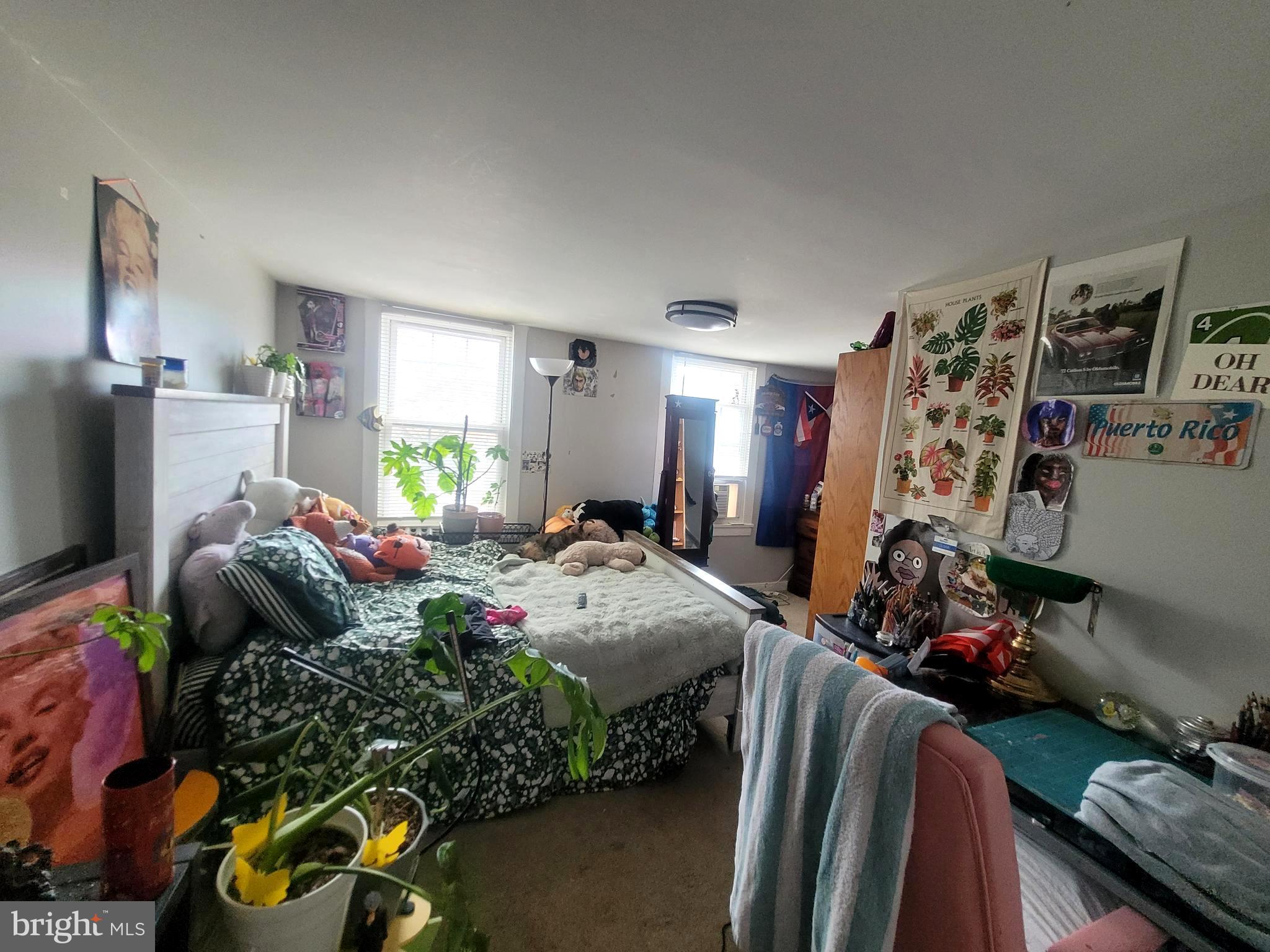 574 Bath Street Bristol, PA 19007 - Photo 13 of 23 a bed room with furniture and a flat screen tv