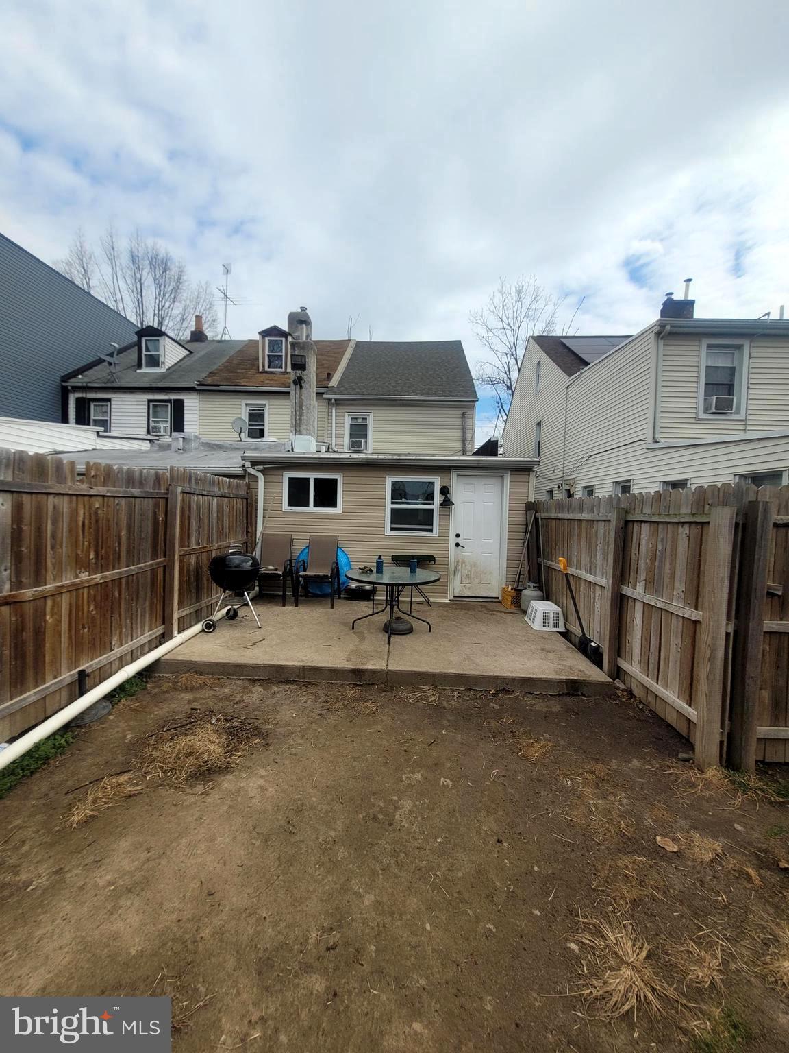 574 Bath Street Bristol, PA 19007 - Photo 20 of 23 a view of a house with wooden fence
