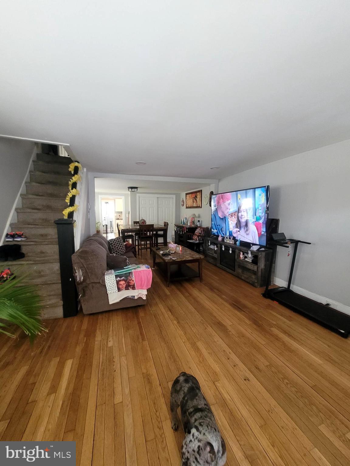 574 Bath Street Bristol, PA 19007 - Photo 2 of 23 a living room with furniture and a flat screen tv