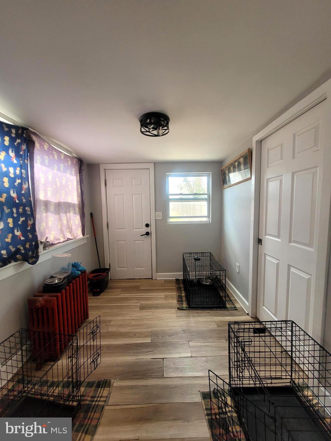 574 Bath Street Bristol, PA 19007 - Photo 5 of 23 a living room with furniture and a window