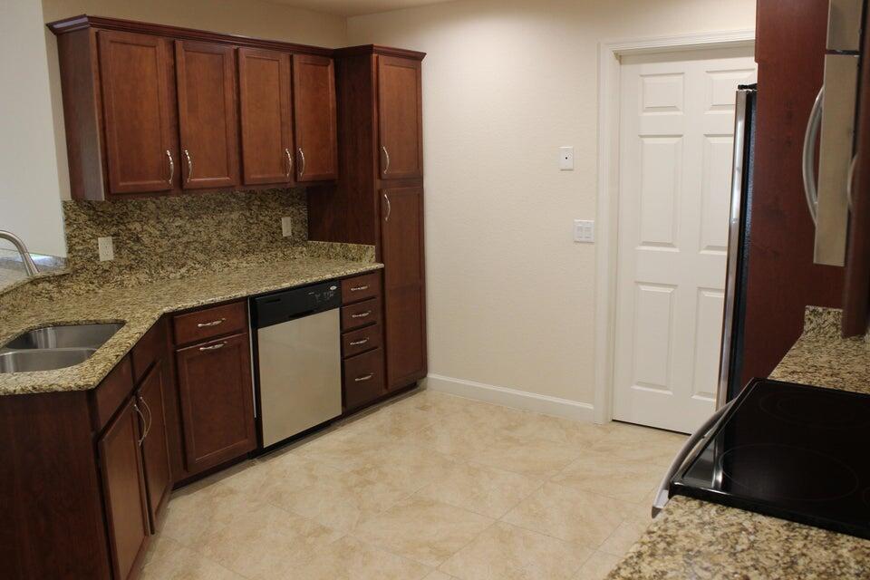 39 Ipanema Way Fort Pierce, FL 34951 - Photo 7 of 15 Carlton Brown Kitchen