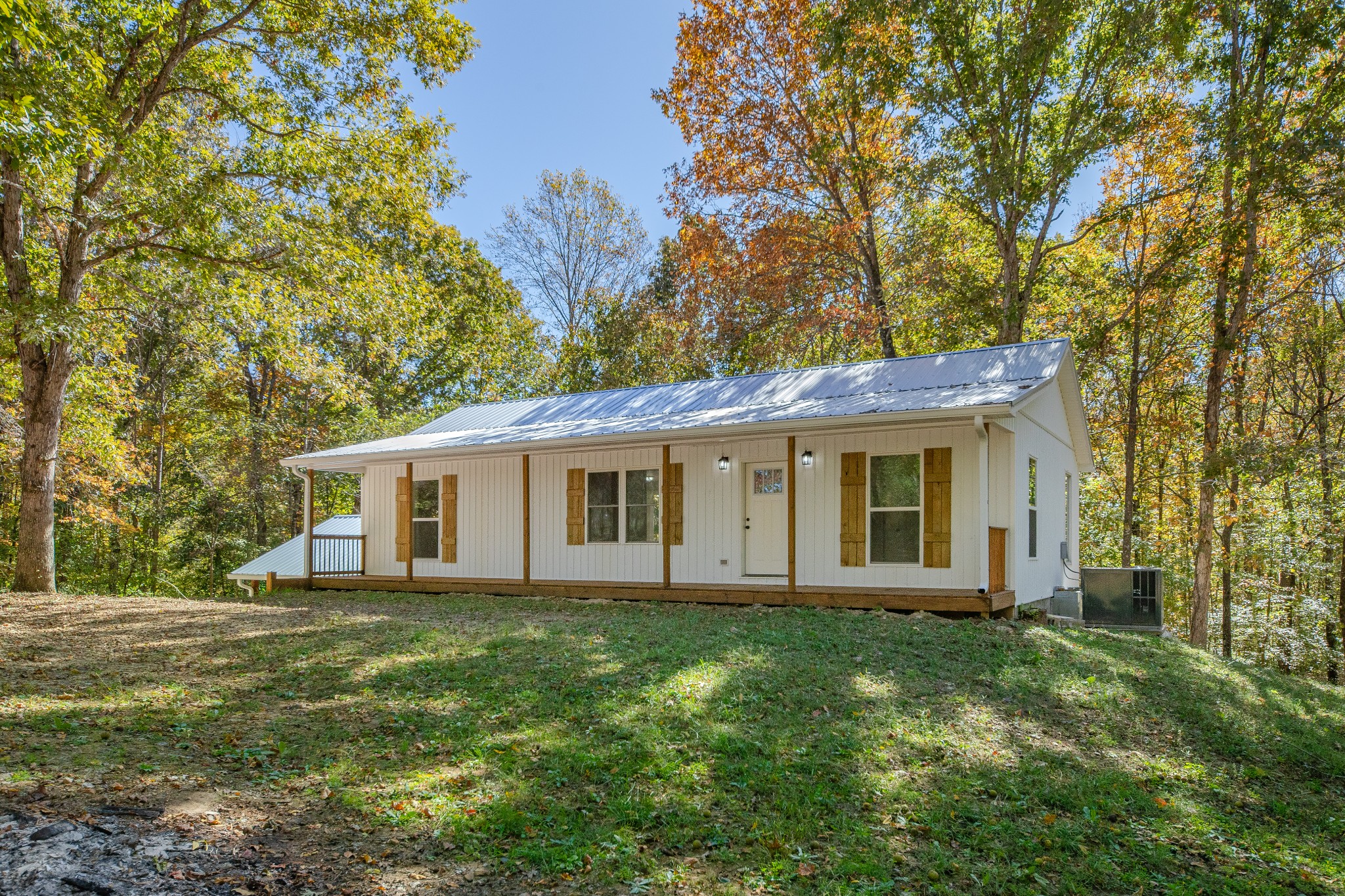 8240 Charlie Brown Road Centerville, TN 37033 - Photo 15 of 72 a view of a house with a backyard