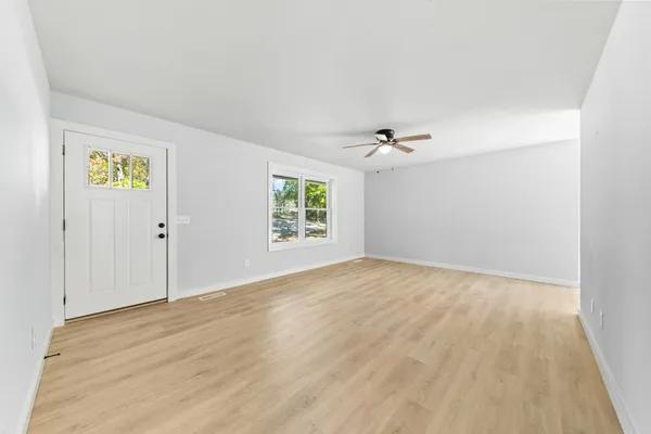 a kitchen with a refrigerator stove and sink