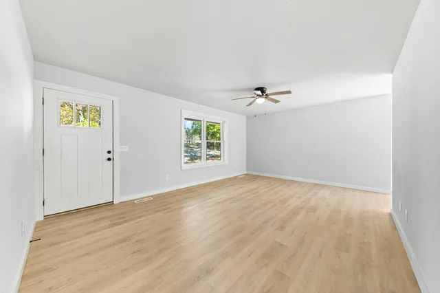 a kitchen with a refrigerator stove and sink