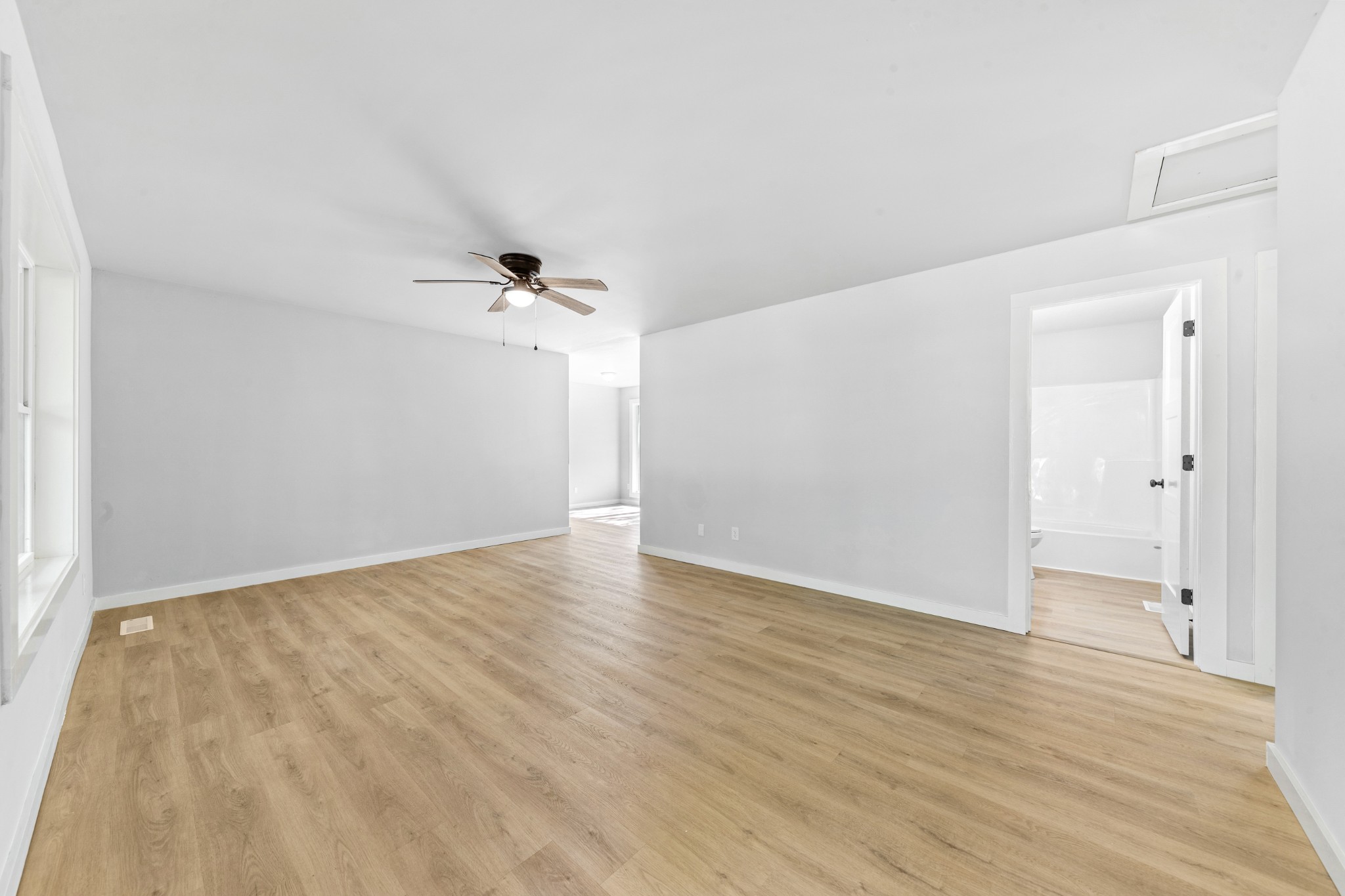 8240 Charlie Brown Road Centerville, TN 37033 - Photo 20 of 72 a view of a room with wooden floor