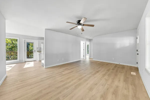 a view of an empty room and window