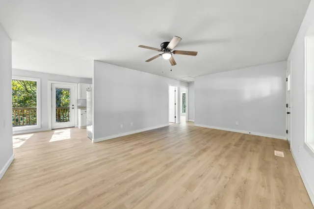 a view of an empty room and window