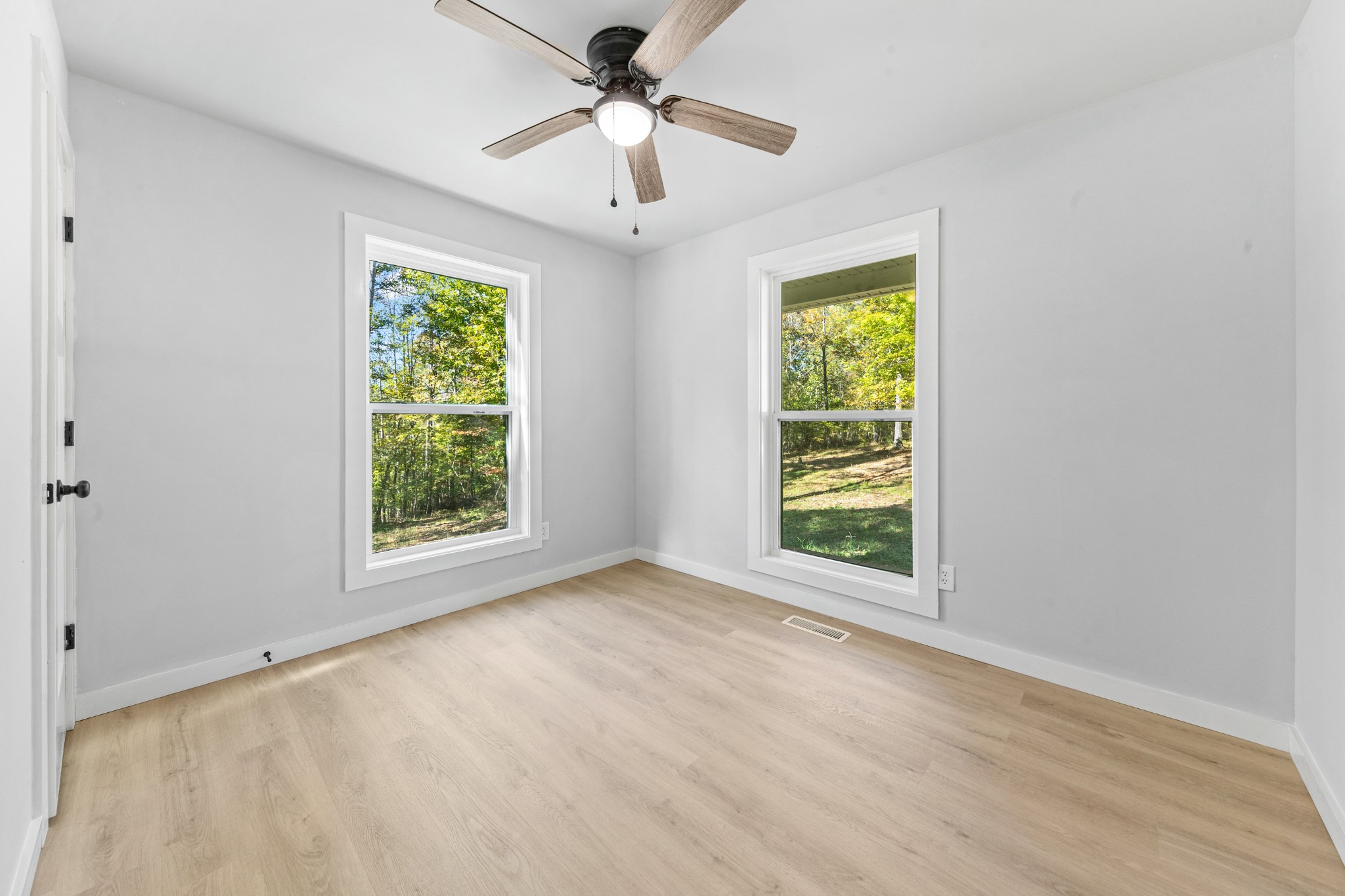 8240 Charlie Brown Road Centerville, TN 37033 - Photo 37 of 72 a view of an empty room with a window