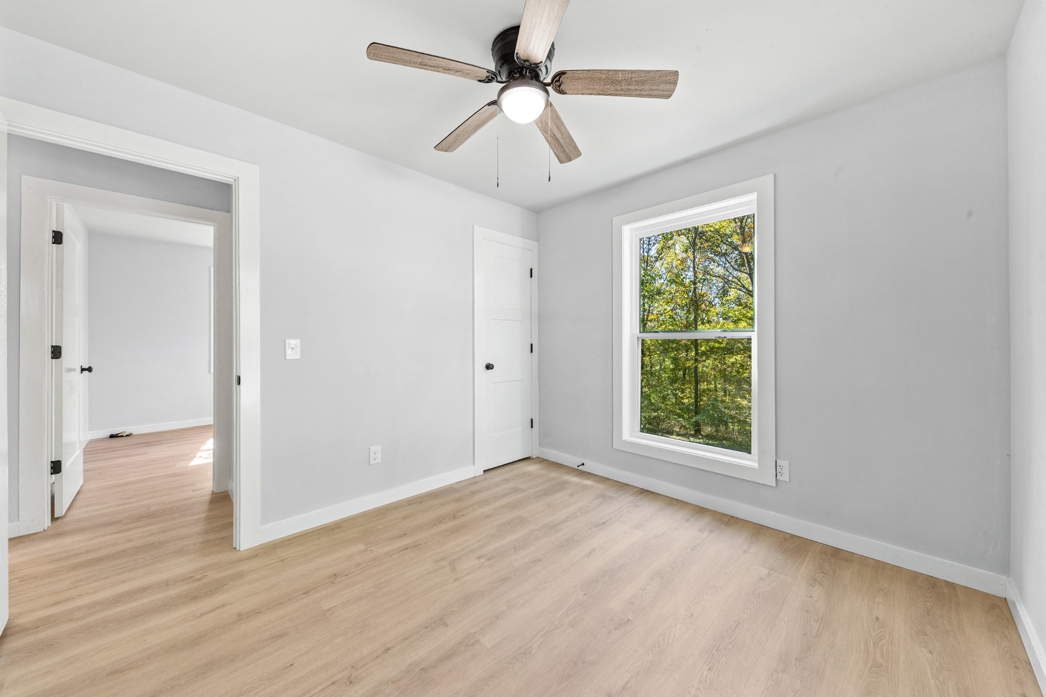 8240 Charlie Brown Road Centerville, TN 37033 - Photo 38 of 72 a view of an empty room with a window