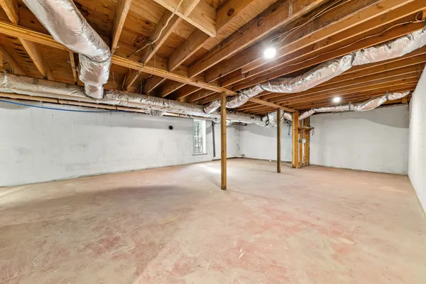 a balcony with wooden floor and fence