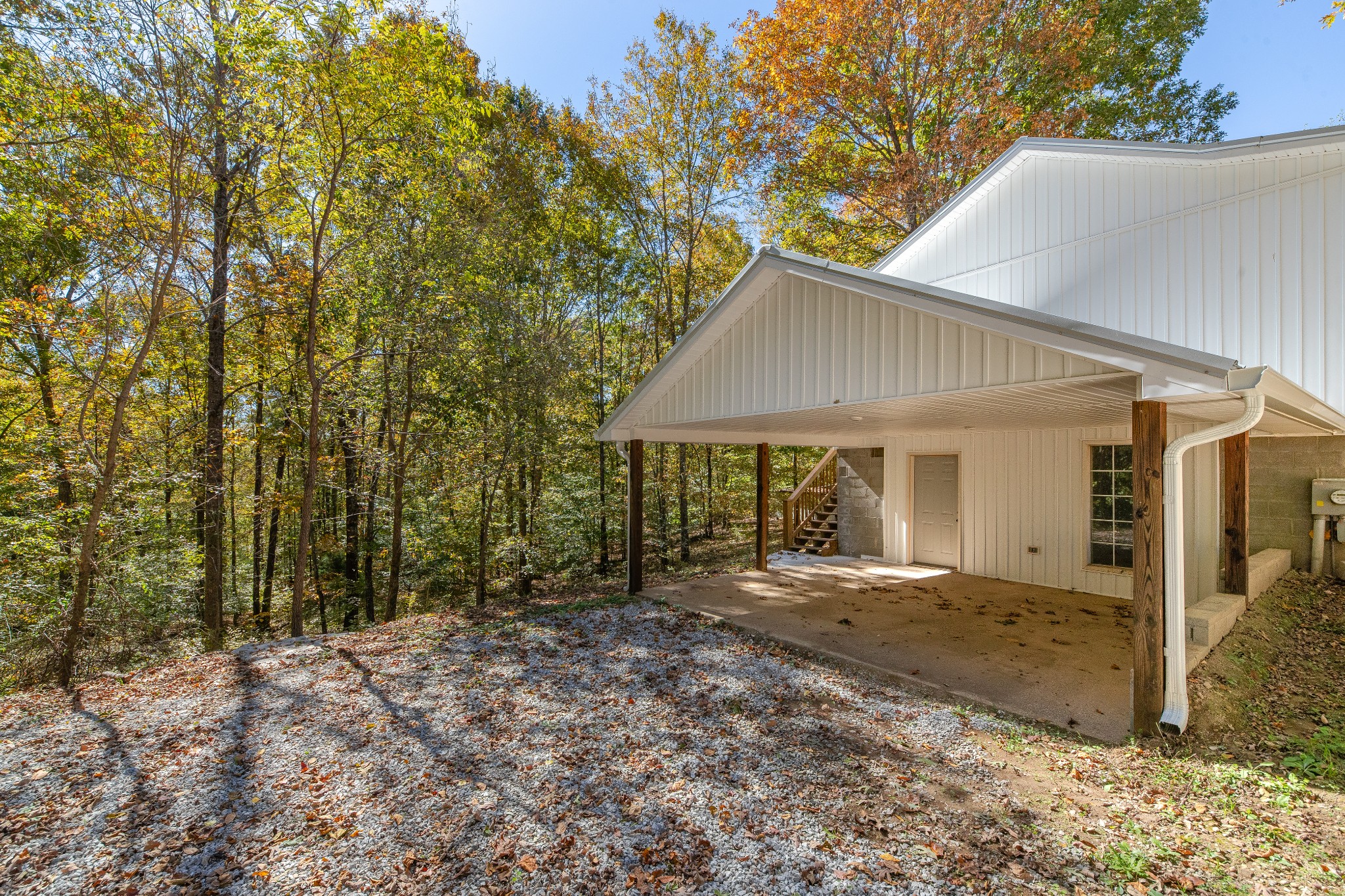 8240 Charlie Brown Road Centerville, TN 37033 - Photo 53 of 72 a front view of a house with a yard and trees