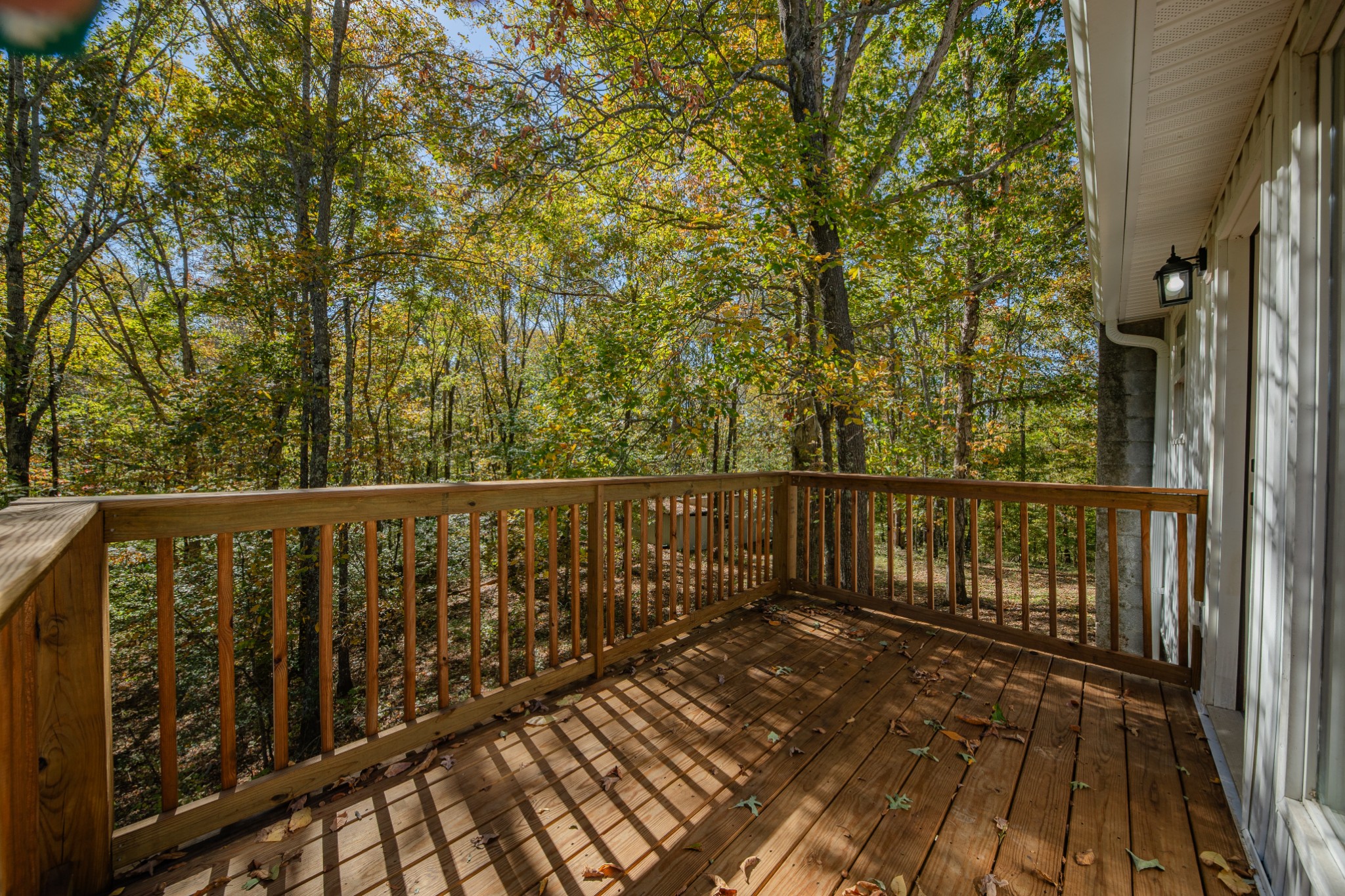 8240 Charlie Brown Road Centerville, TN 37033 - Photo 61 of 72 a balcony with wooden floor and fence