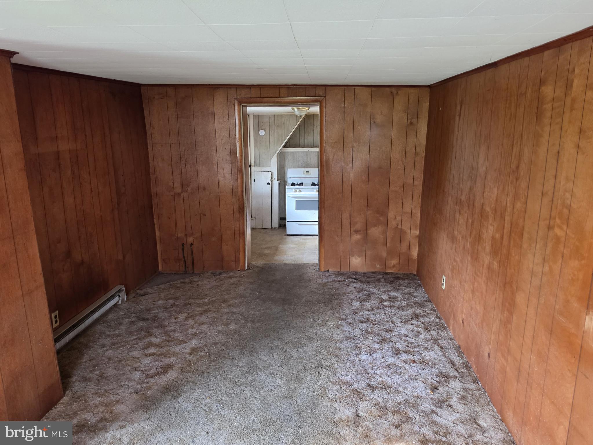 6018 Conover Road Taneytown, MD 21787 - Photo 7 of 18 a view of entryway with wooden walls