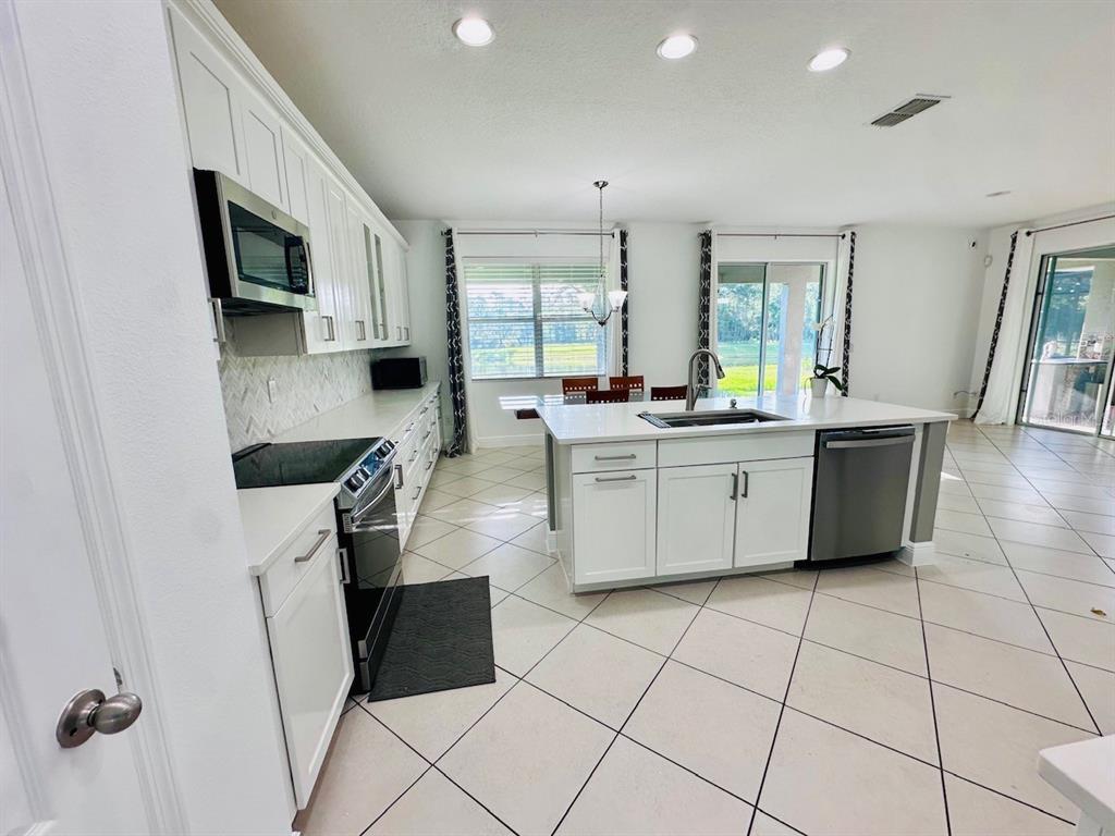 10726 Cabbage Tree Loop Orlando, FL 32825 - Photo 5 of 26