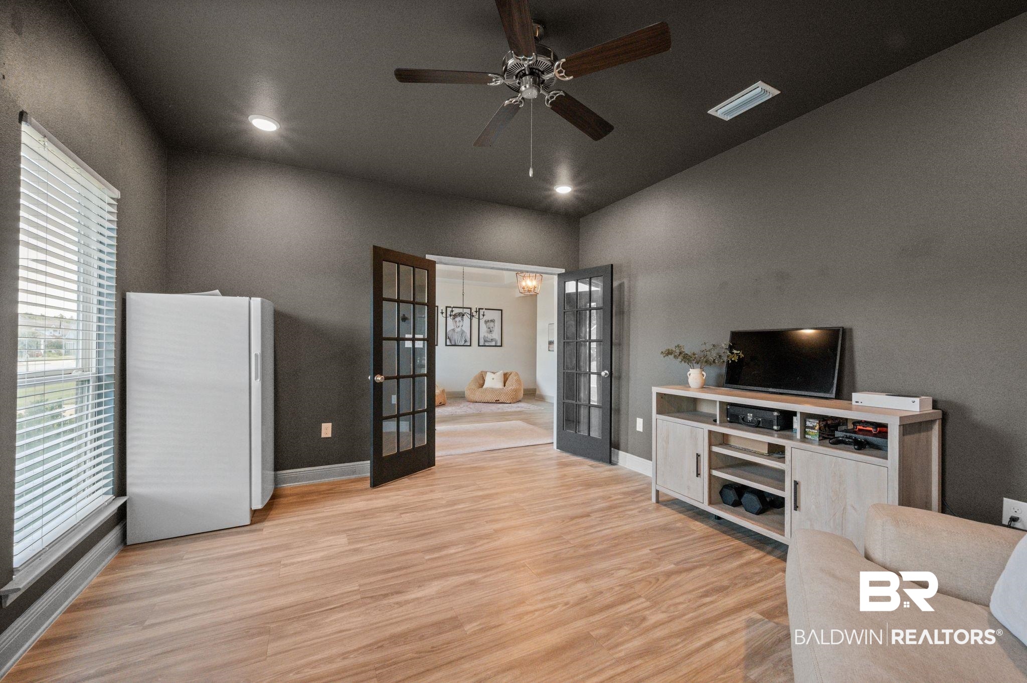 10169 Dunleith Loop Daphne, AL 36526 - Photo 17 of 40 Living area featuring french doors, light wood-type flooring, a ceiling fan, and recessed lighting