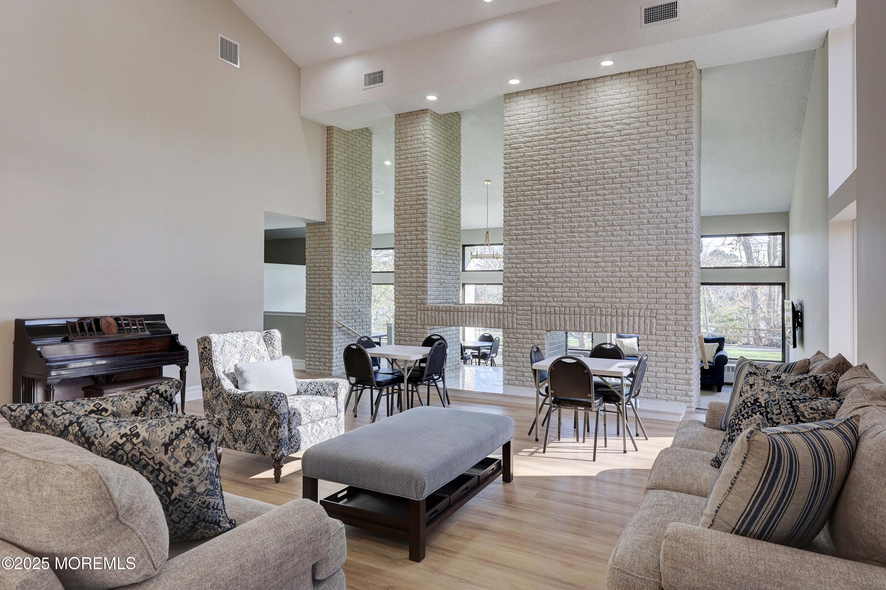 16 Concord Court Red Bank, NJ 07701 - Photo 32 of 63 a living room with furniture and wooden floor