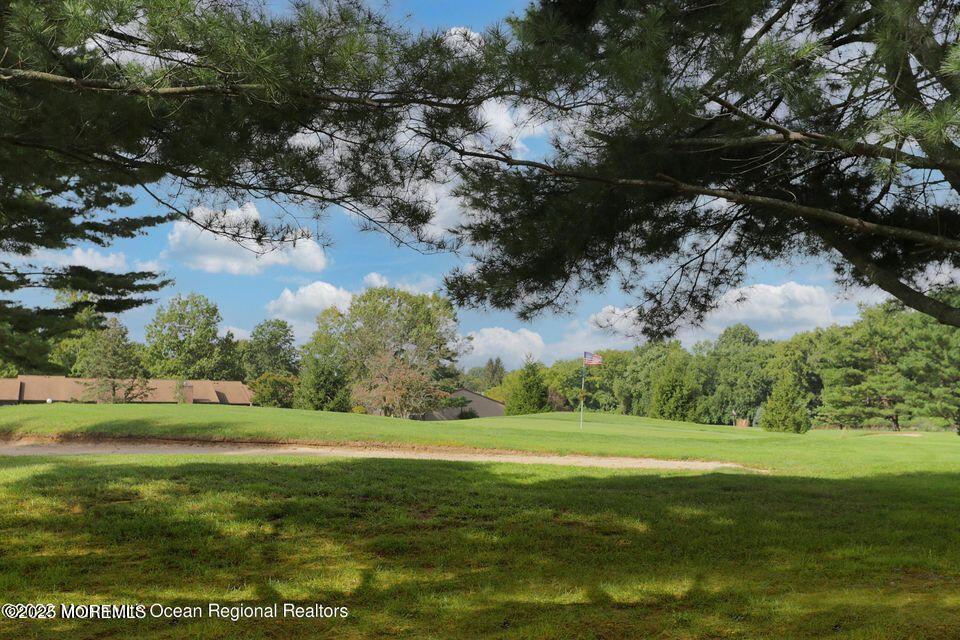 16 Concord Court Red Bank, NJ 07701 - Photo 47 of 63 a view of a golf course with a lake view