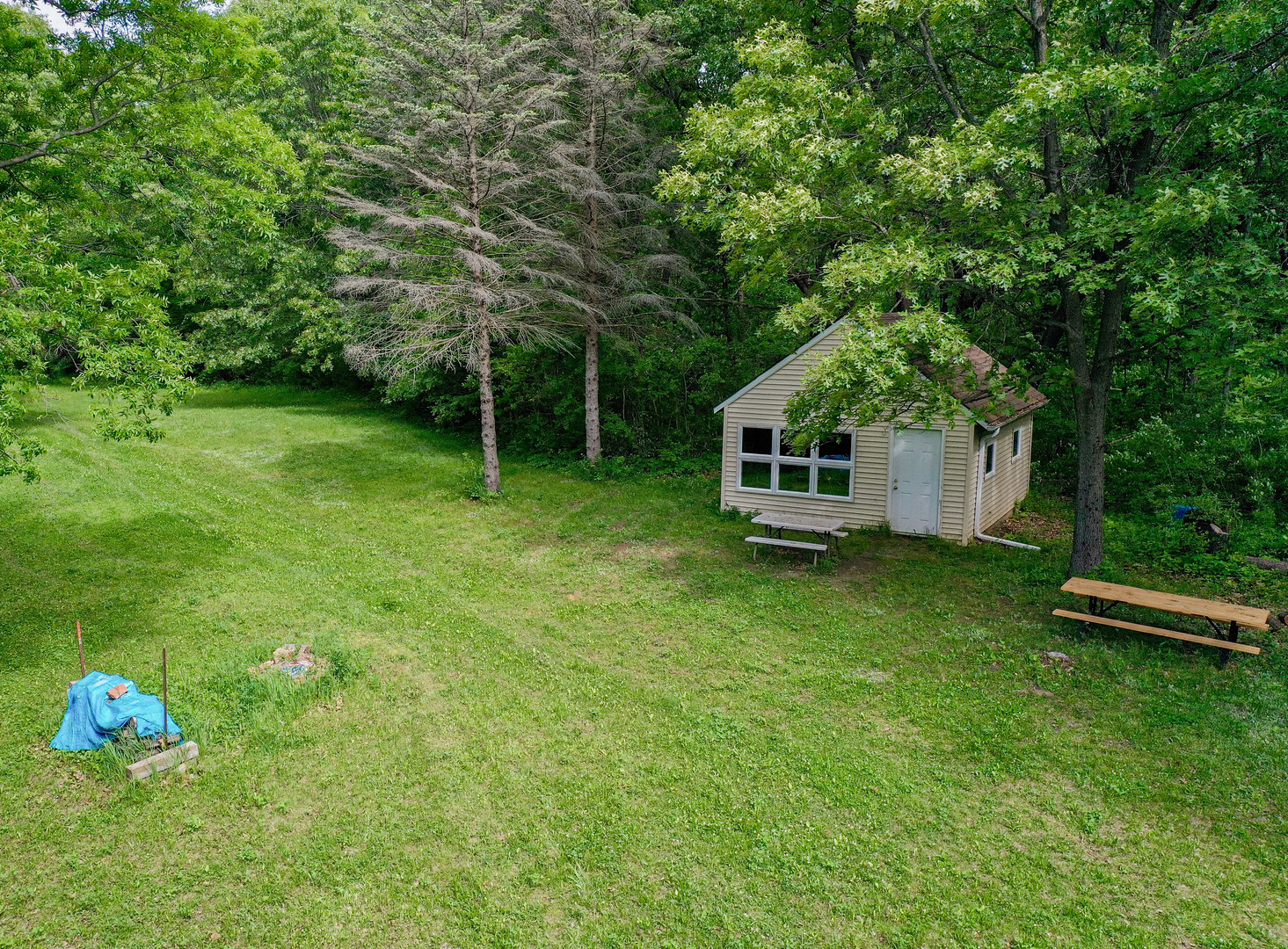 0 Three Mile Road Savanna, IL 61074 - Photo 11 of 32 a house with a tree in front of it