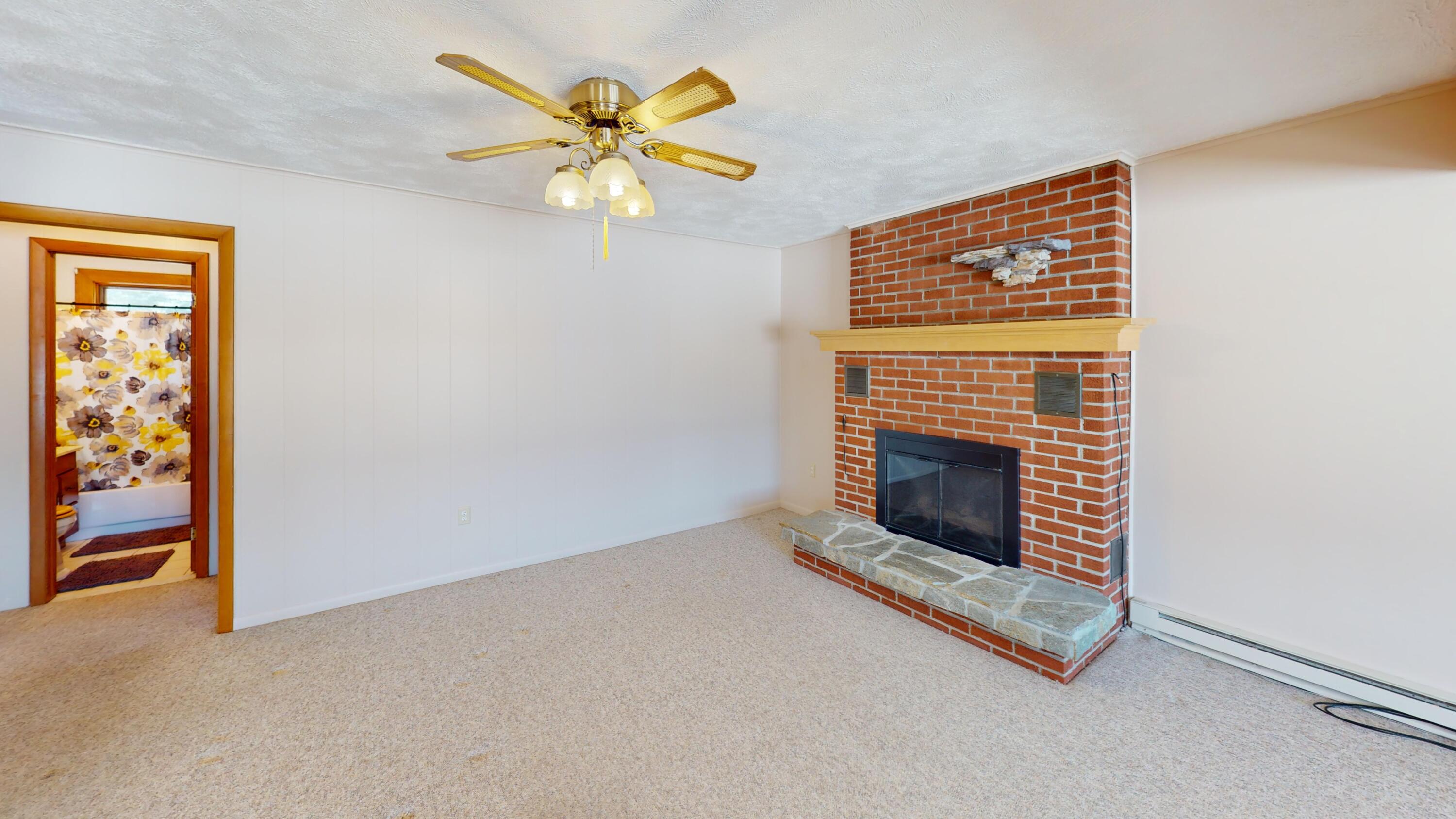9055 Chub Lake Ridge Road Gaylord, MI 49735 - Photo 39 of 52 9055-Chub-Lake-Ridge-Rd-Living-Room 1