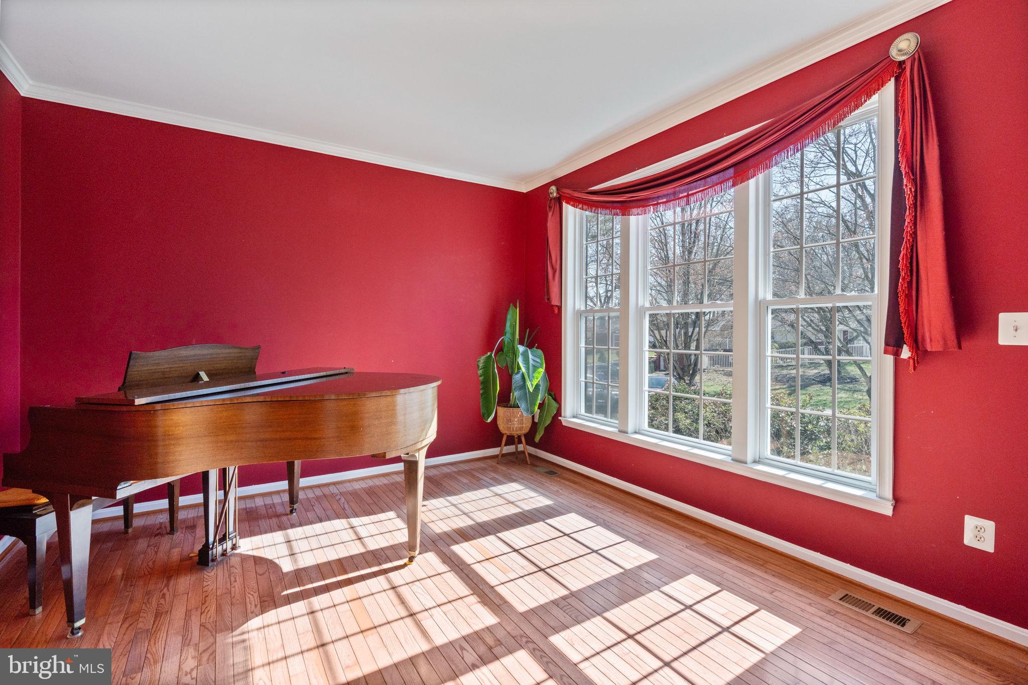 12298 Wake Forest Road Clarksville, MD 21029 - Photo 12 of 46 a view of a room with wooden floor and windows