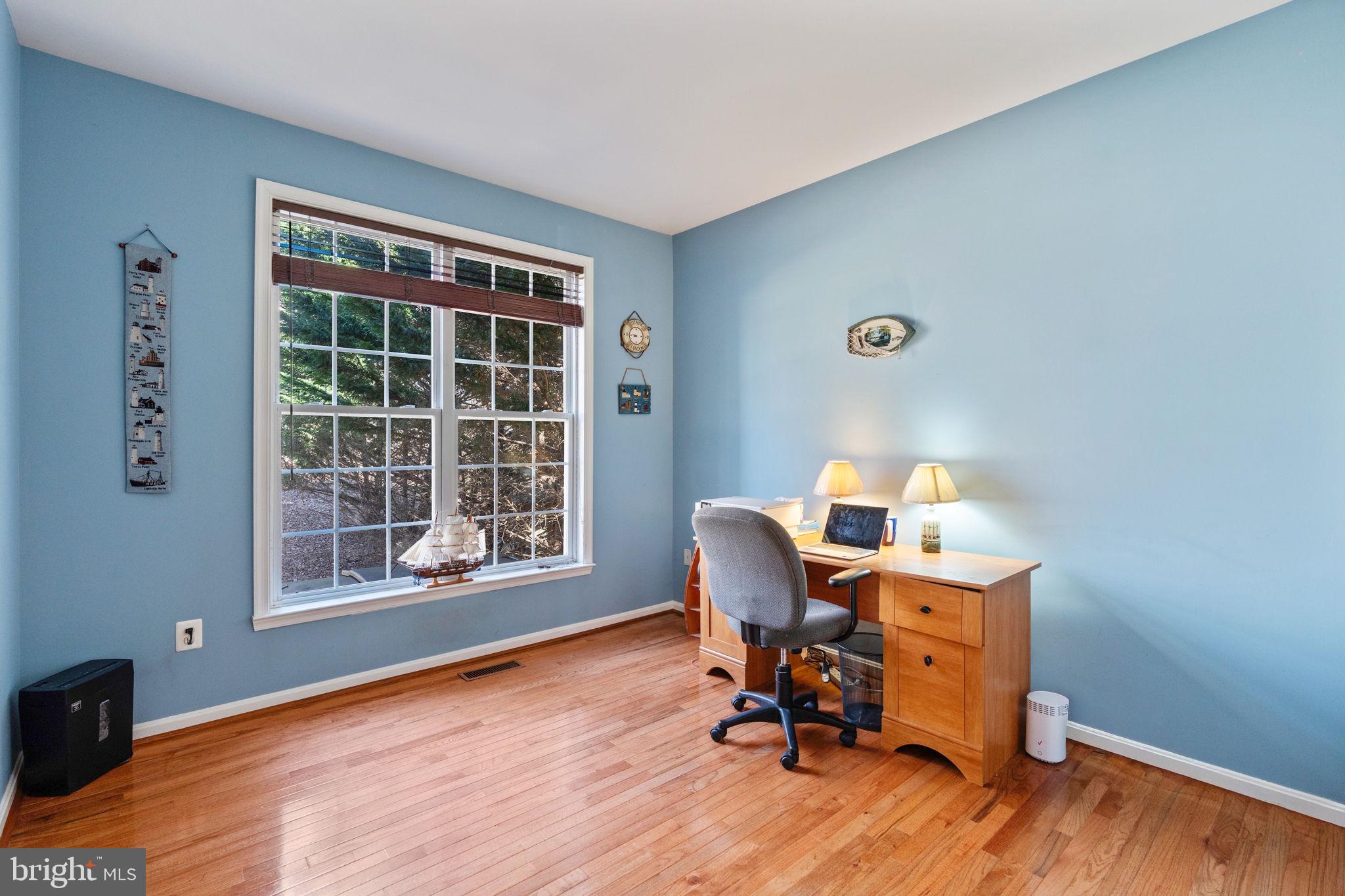 12298 Wake Forest Road Clarksville, MD 21029 - Photo 14 of 46 a view of a workspace with furniture and a window
