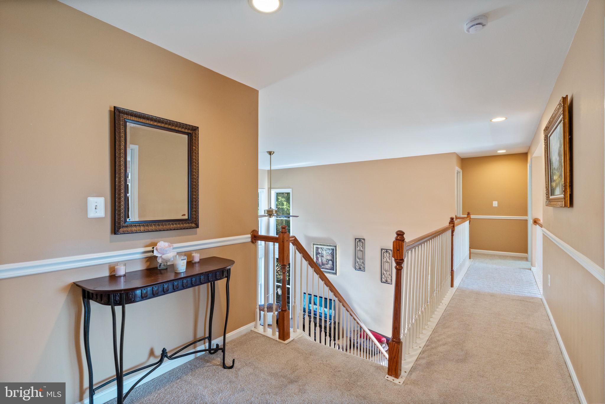 12298 Wake Forest Road Clarksville, MD 21029 - Photo 32 of 46 a view of a hallway with windows