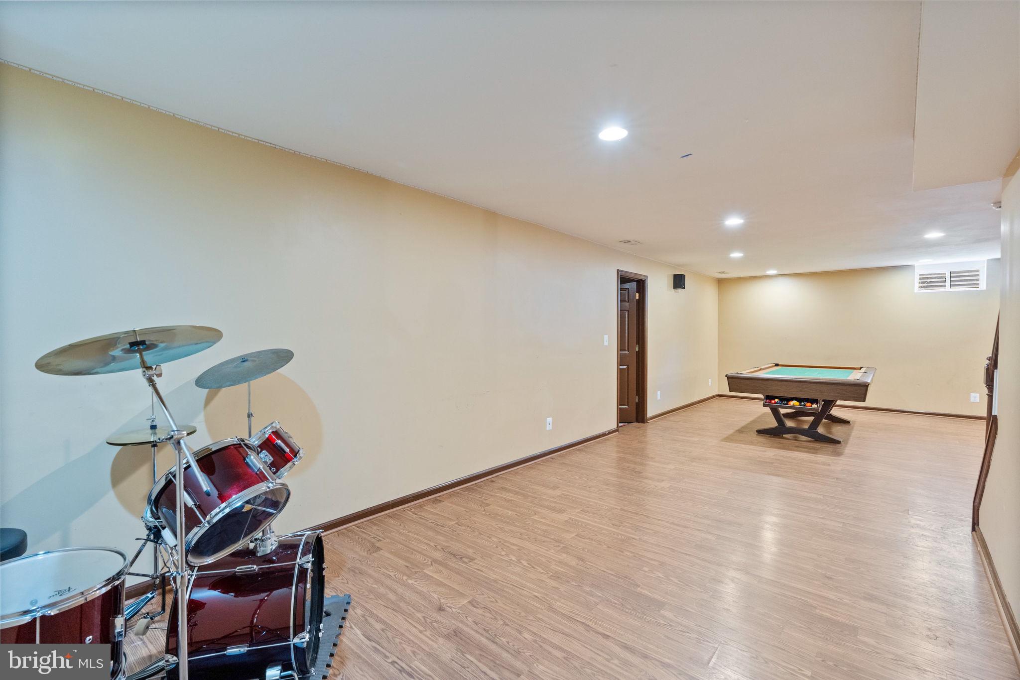 12298 Wake Forest Road Clarksville, MD 21029 - Photo 37 of 46 a room with furniture and a gym equipment