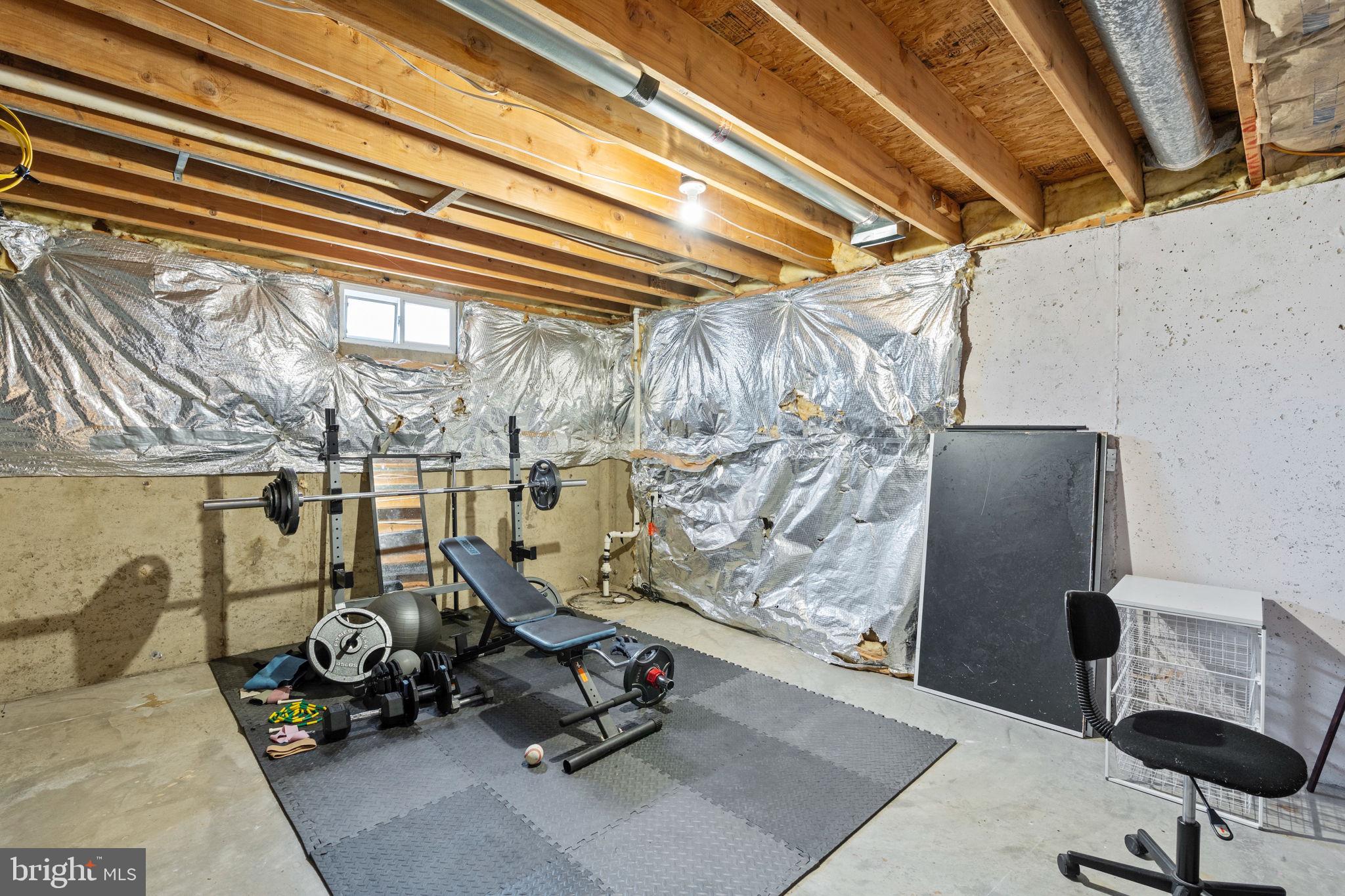 12298 Wake Forest Road Clarksville, MD 21029 - Photo 39 of 46 a view of a room with gym equipment