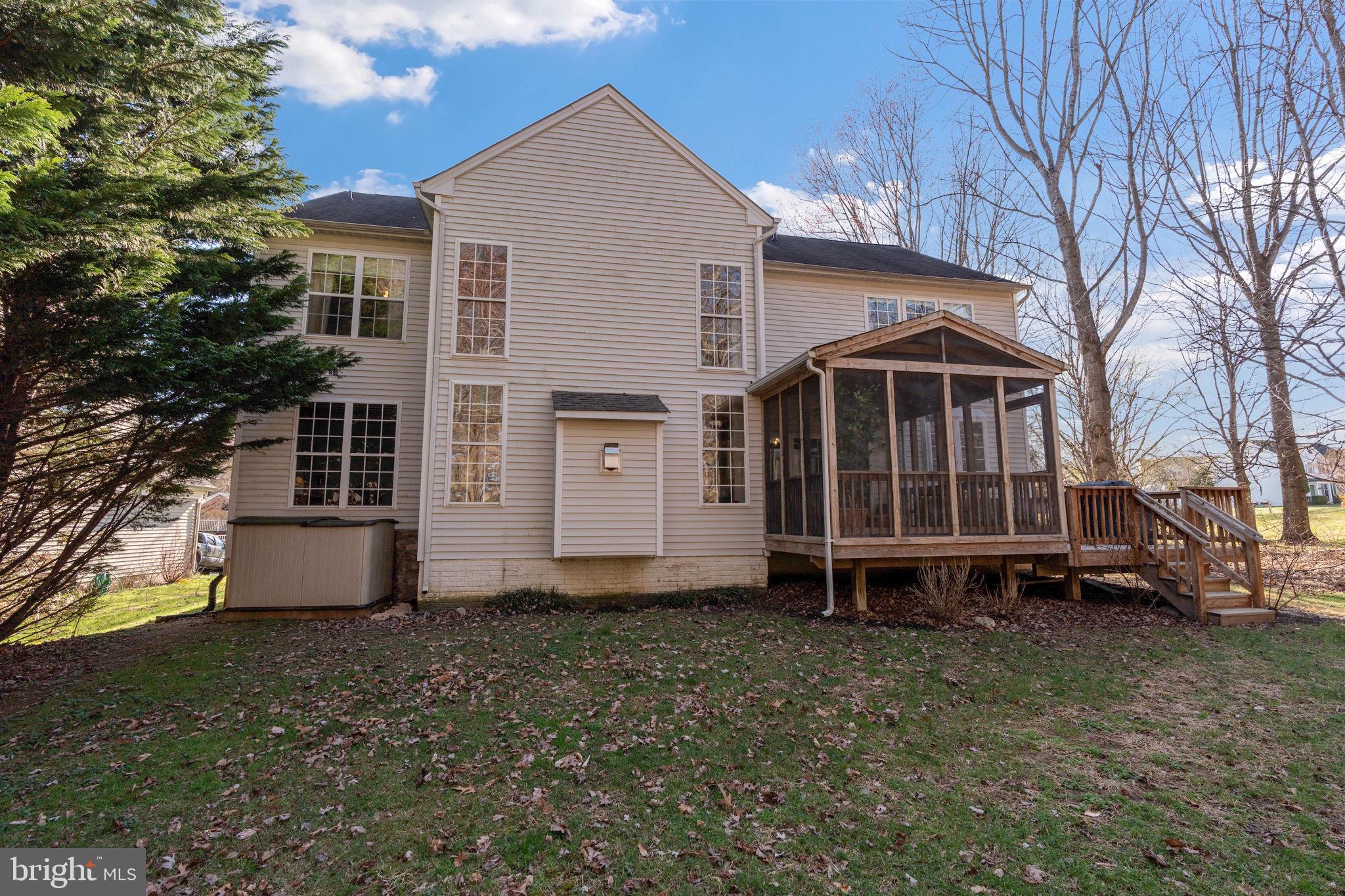 12298 Wake Forest Road Clarksville, MD 21029 - Photo 45 of 46 a front view of a house with a yard