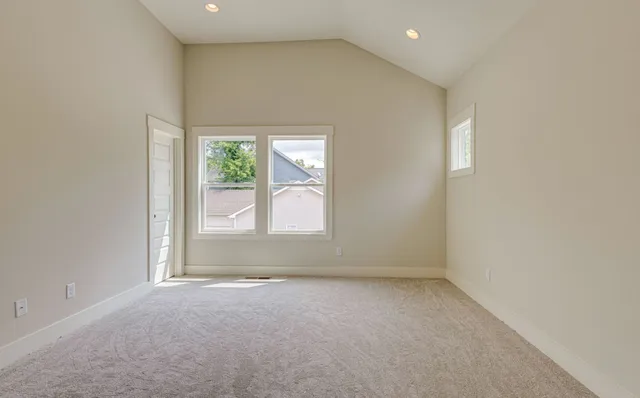 an empty room with windows