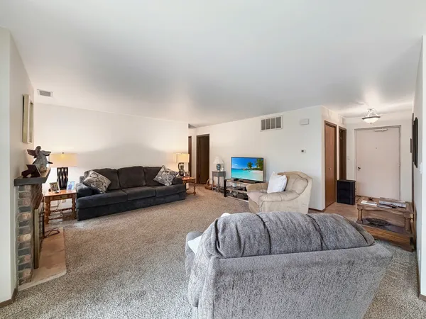 a living room with furniture and a couch