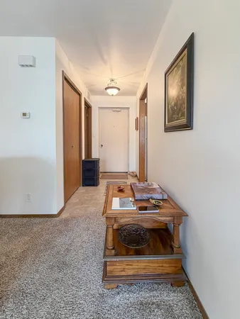 a bedroom with a bed and a stove