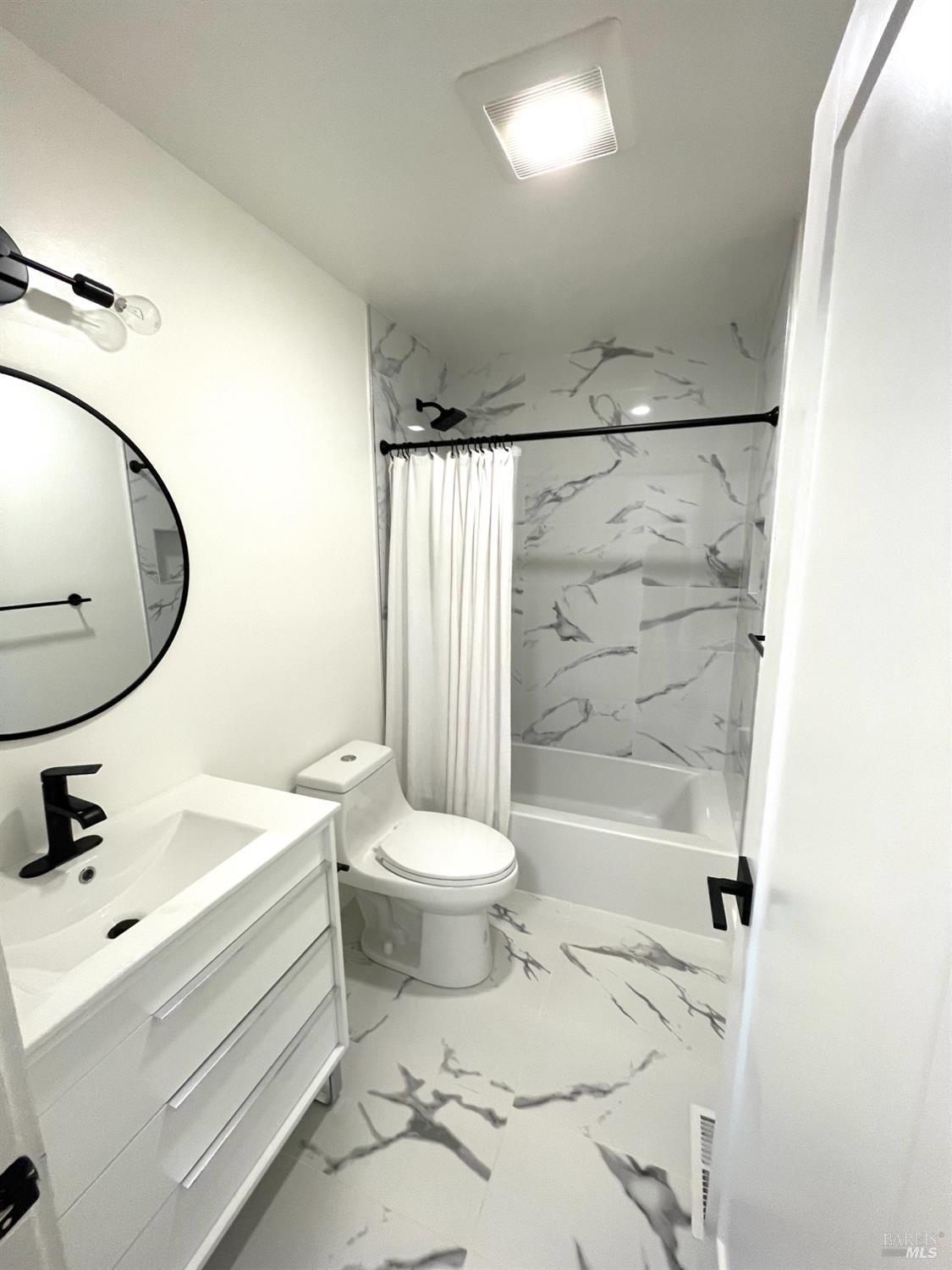 239 Corte Madera Avenue Corte Madera, CA 94925 - Photo 14 of 21 a bathroom with a sink toilet and shower