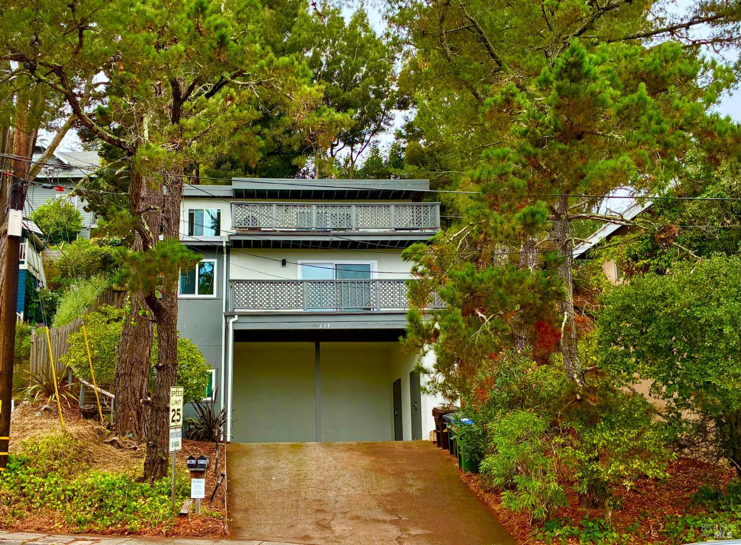 239 Corte Madera Avenue Corte Madera, CA 94925 - Photo 3 of 21 front view of a house with a tree