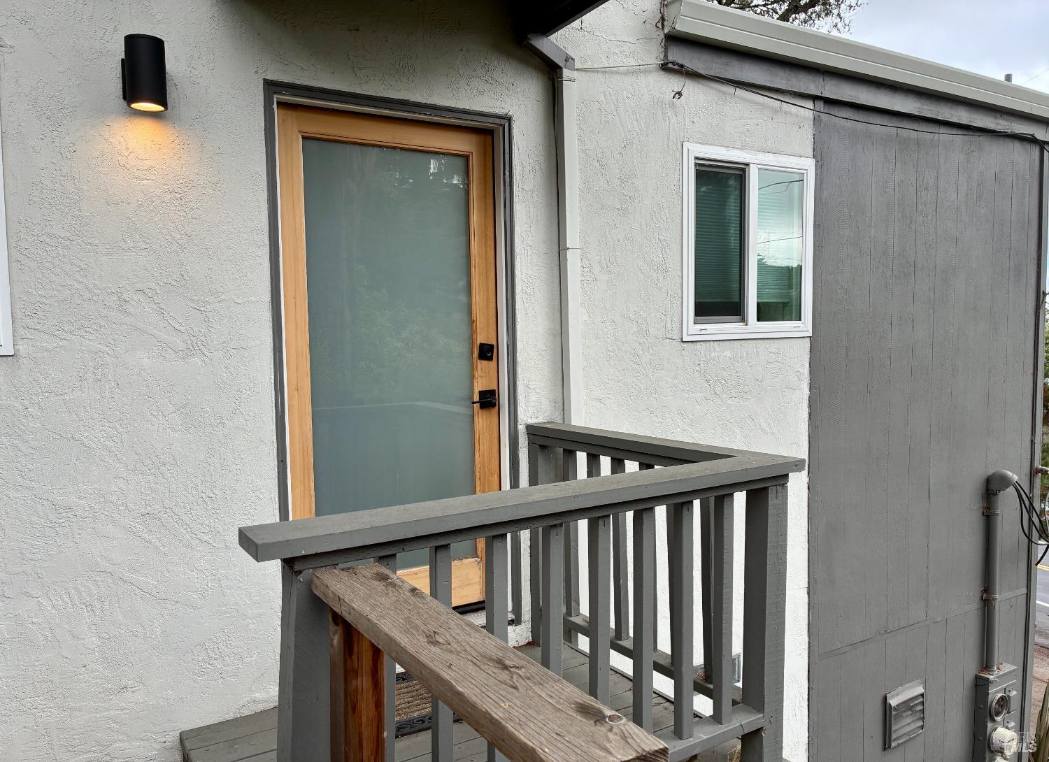 239 Corte Madera Avenue Corte Madera, CA 94925 - Photo 4 of 21 a view of staircase with railing and a window