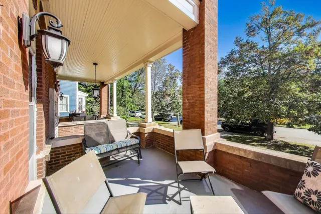 a building outdoor space with patio furniture