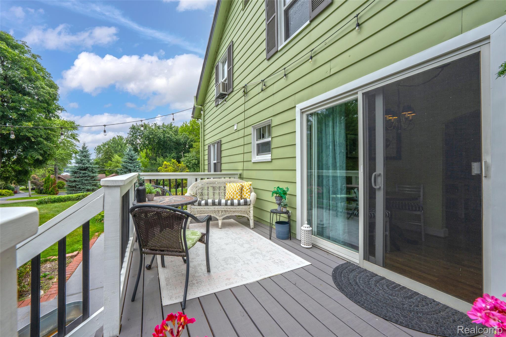 3841 Covert Road Waterford, MI 48328 - Photo 50 of 87 Exterior deck with a gray finish, white railing, and sliding glass door