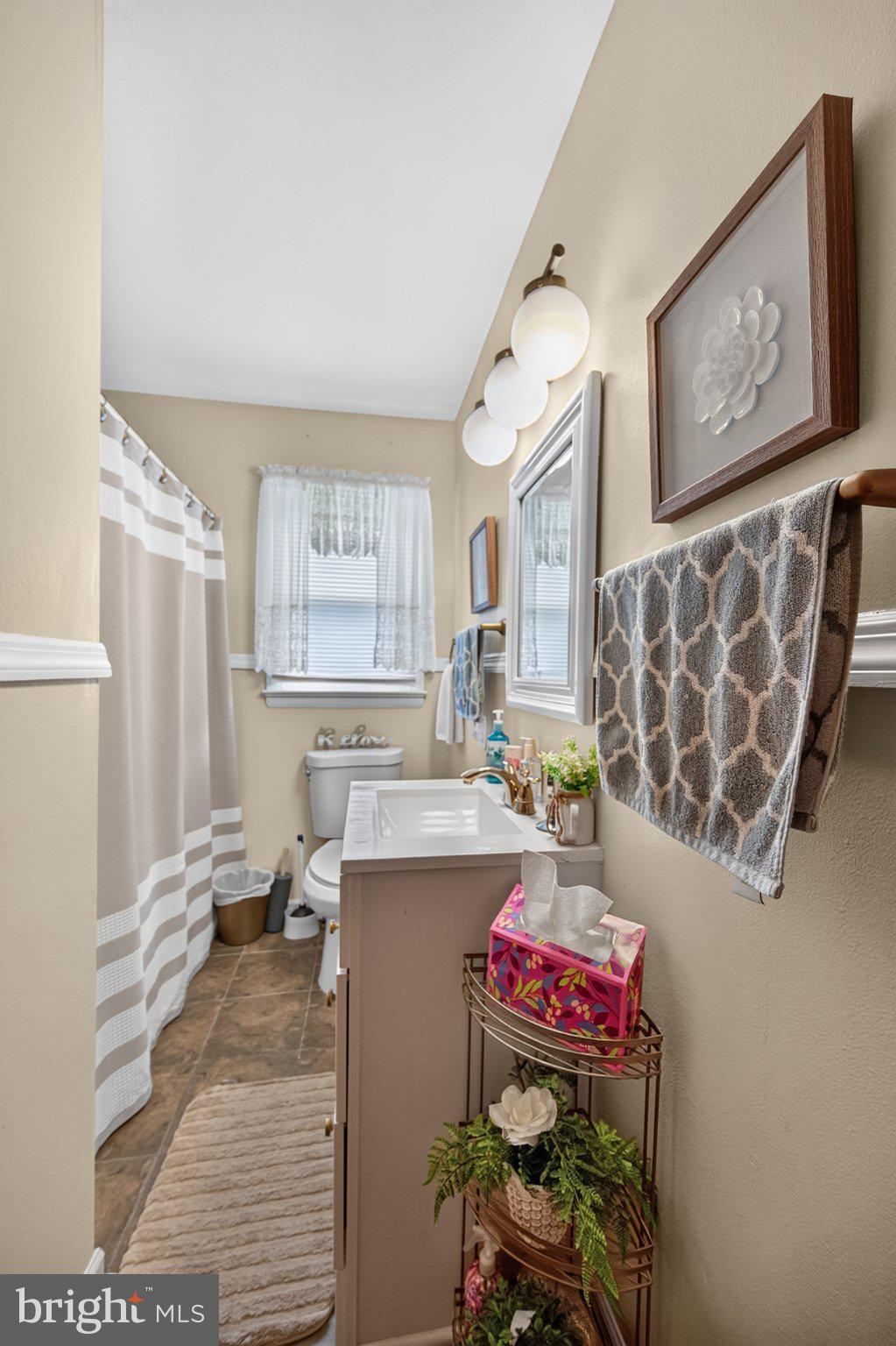 9005 Charles Town Road Ranson, WV 25438 - Photo 20 of 31 Charming bathroom with natural light.