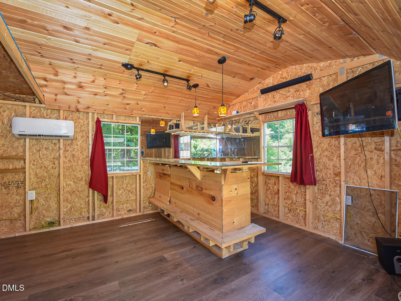 1703 St Patrick Drive Raleigh, NC 27603 - Photo 23 of 29 a room with lot of wooden floors and windows