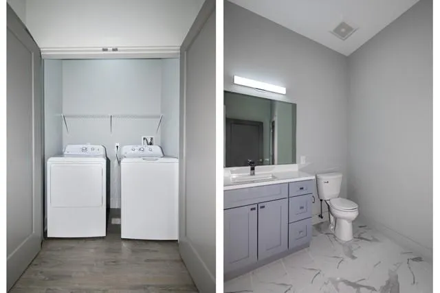 a view of bathroom with a toilet sink and mirror