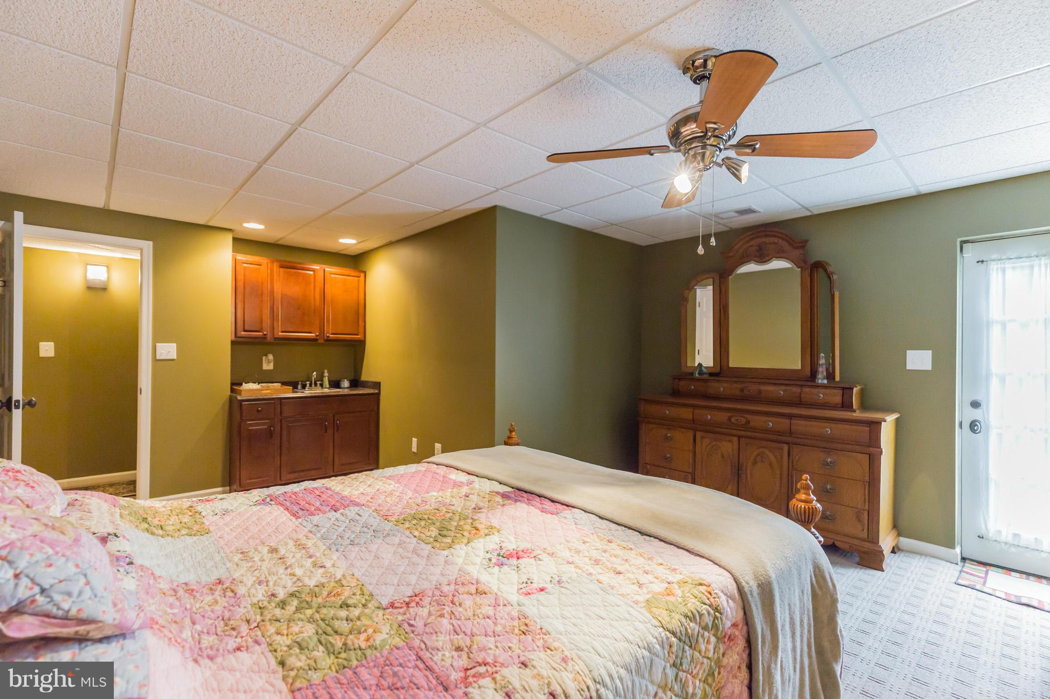 450 Bowie Shop Road Huntingtown, MD 20639 - Photo 20 of 30 Third Bedroom on Lower Level with Private Wet Bar