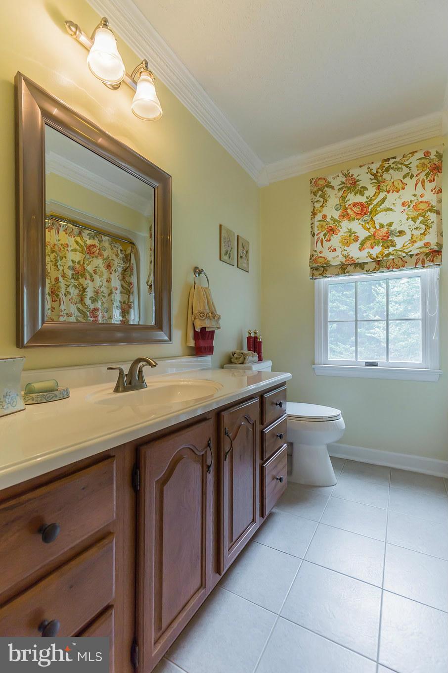 450 Bowie Shop Road Huntingtown, MD 20639 - Photo 22 of 30 Updated Full Bath with Extended Vanity