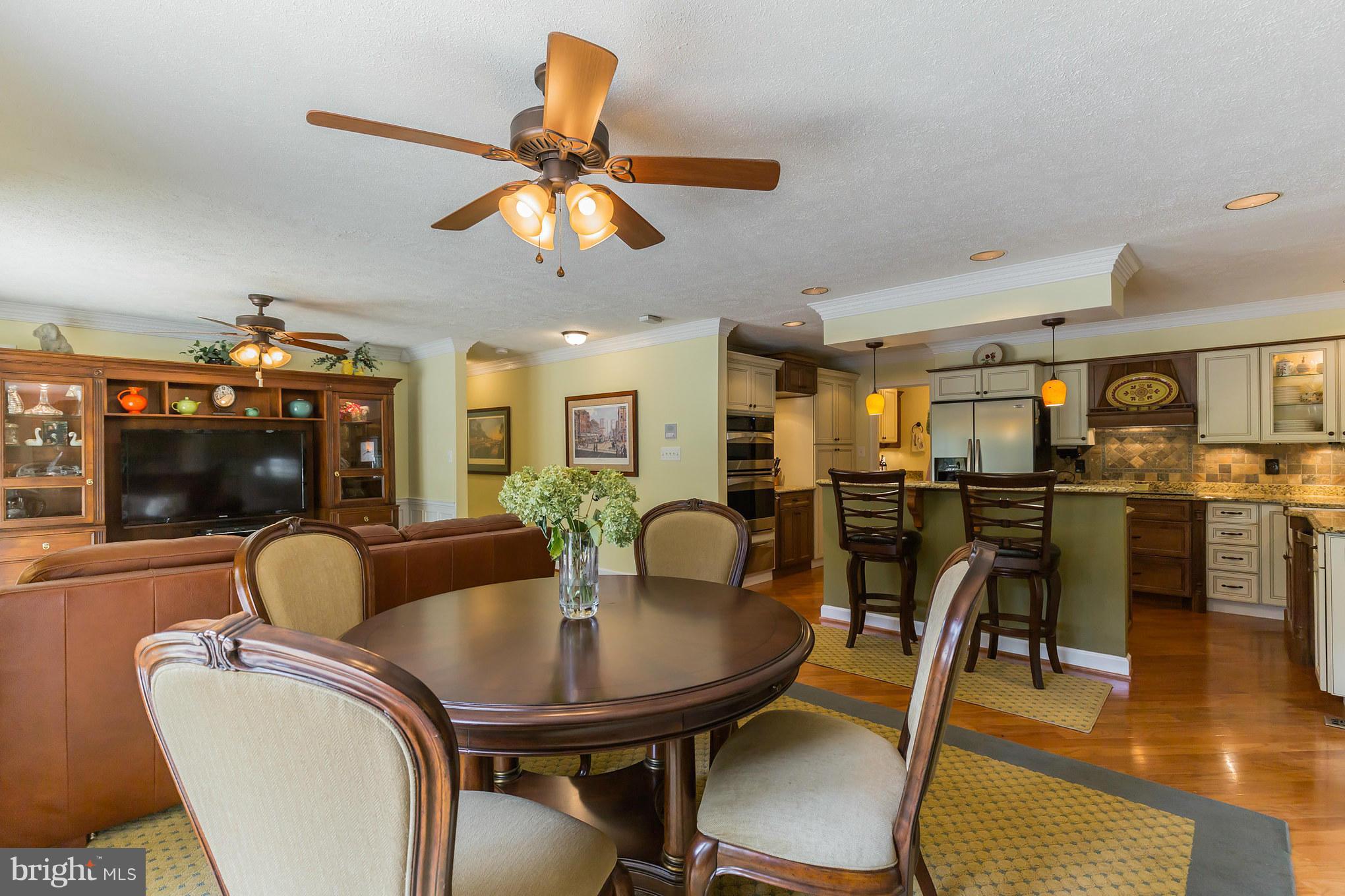 450 Bowie Shop Road Huntingtown, MD 20639 - Photo 10 of 30 Dining Area off Kitchen with Fireplace