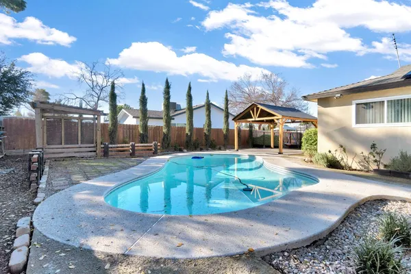 a view of a house with entertaining space